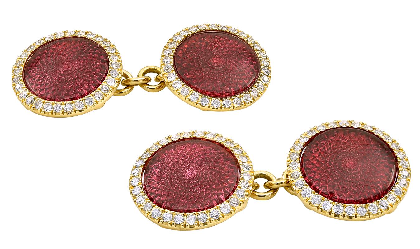 Outstanding antique double-sided cufflinks.  Brilliant crimson red guilloche enamel surrounded by fiery white diamonds.  Set in solid gauge 18K yellow gold.  Beautifully detailed backs, with chain link closure.  2/3