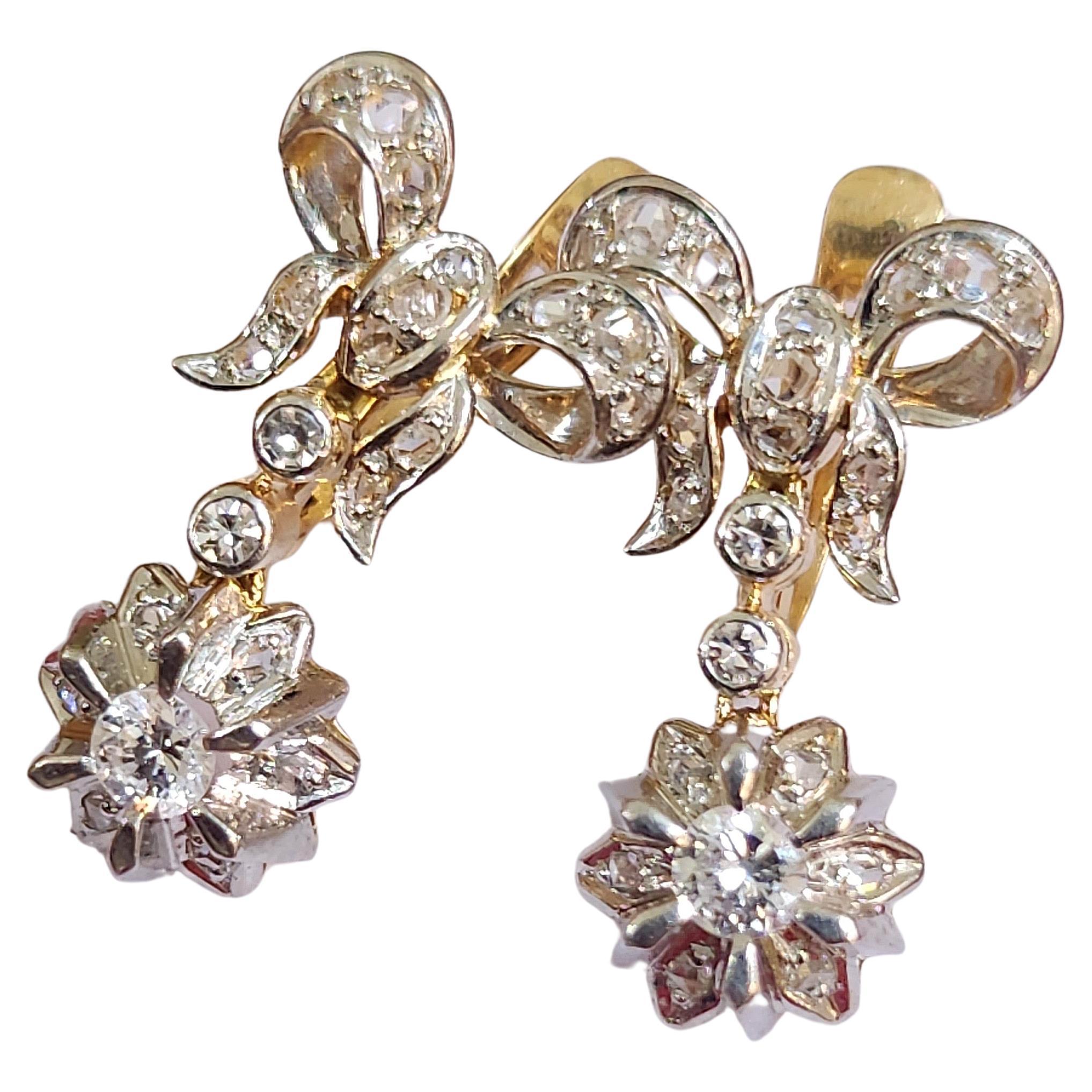 Old european diamond earrings in 18k white and yellow gold with ribbon designe dangling earrings estimate weight 0.70 carats total lenght 2.50 cm in fine workmanship