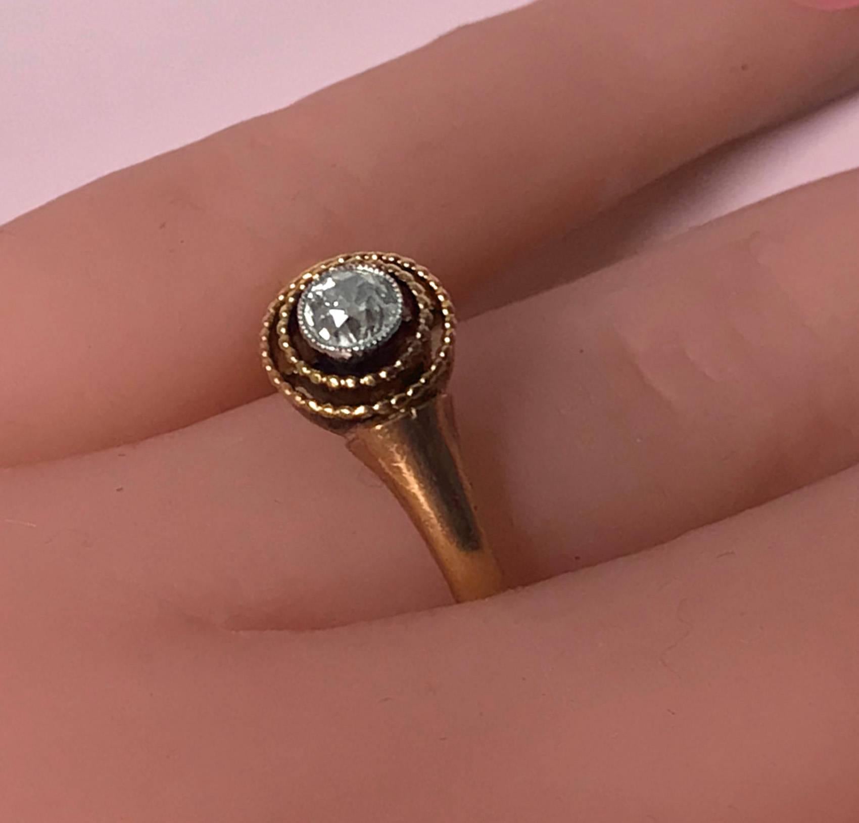 Antique Diamond Gold Ring, Continental C.1910. The 14K Ring milligrain set with an old mine cut diamond, approximately 0.30 ct, approximately VS2-SI1 clarity, I-J colour, open double bead concentric border surround, plain shank. Total Item Weight: