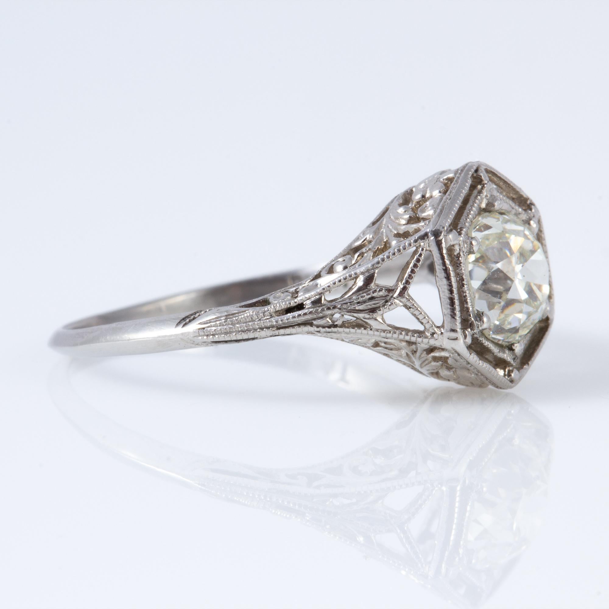 Platinum setting with @.90ct. center stone.  Beautifully cut, with just a touch of yellow to the stone.  Looks to be from the very early 20th century, probably between 1900 and 1910.  