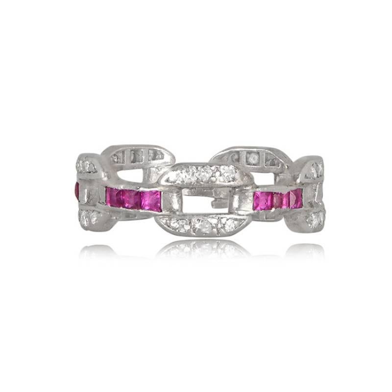 This exceptional Art Deco band, crafted in platinum during the 1920s, showcases a unique design with alternating diamond links and calibre natural rubies. Its Antique charm and intricate composition make it a rare and original piece.

Ring Size: