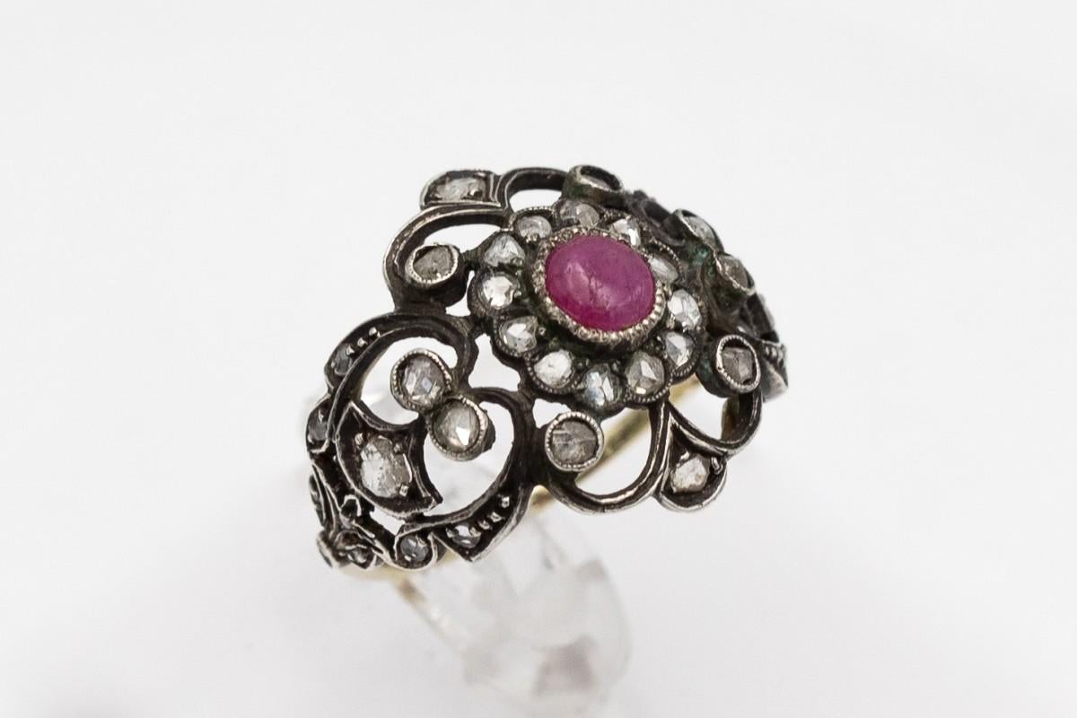 Antique silver and gold ring with ruby, diamonds and synthetic corundum.

Origin: Poland, Warsaw, early 20th century.

Hallmarking: hallmark for gold 0.585, additional silver hallmark and the letter W (Polish hallmarks used in 1920-1931) stamped on