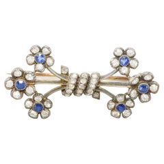 Antique Diamond & Sapphire Floral Brooch in 14K Gold and Silver, approx 1.25 ctw