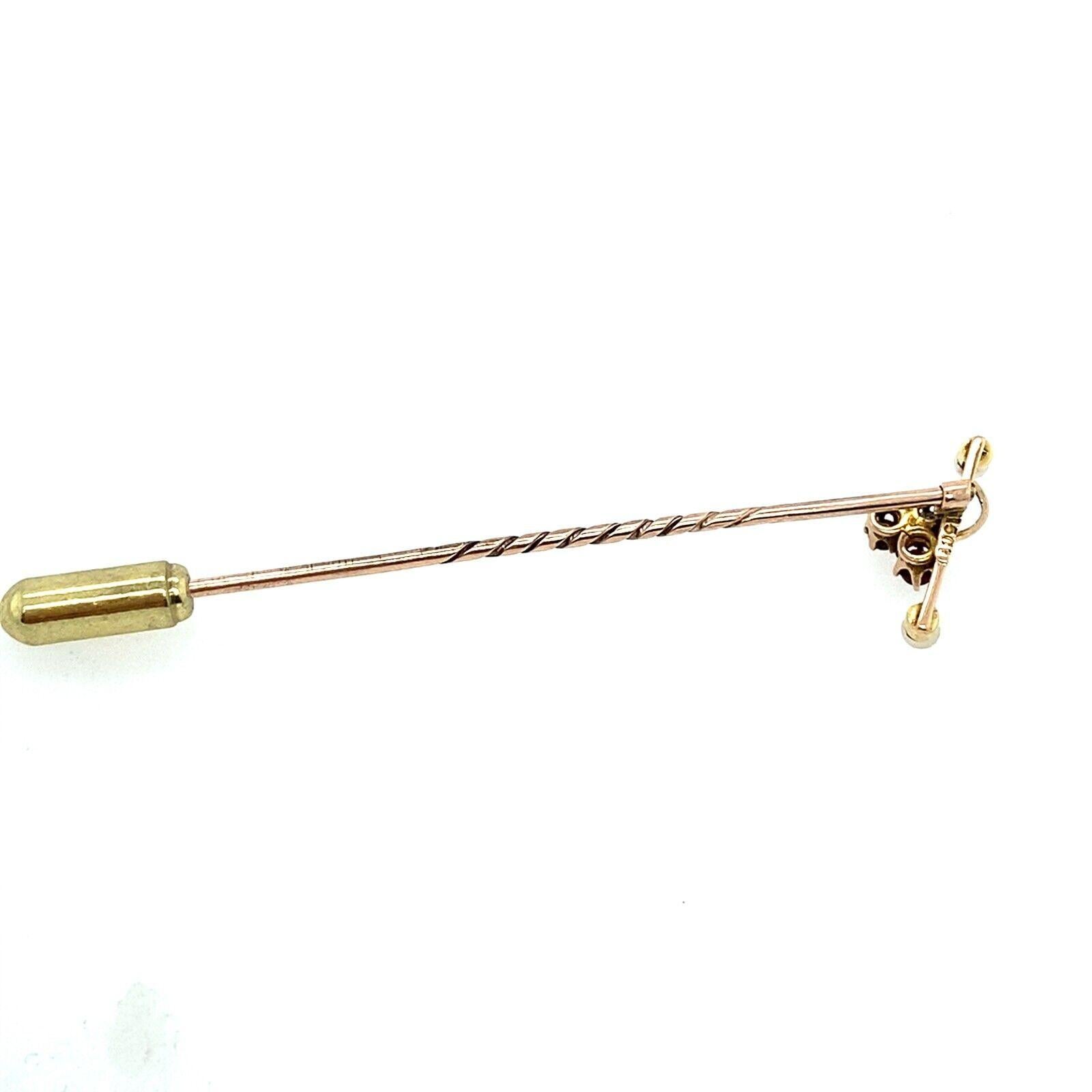 This beautiful stickpin can be worn for any occasion. It is made of 15ct Rose Gold and contains 1 Victorian cut Diamond, Sapphire, Ruby and Cultured Pearls.

Additional Information:
Total Gold Weight: 1.1g
Total Diamond Weight: 0.04ct
Dimension: