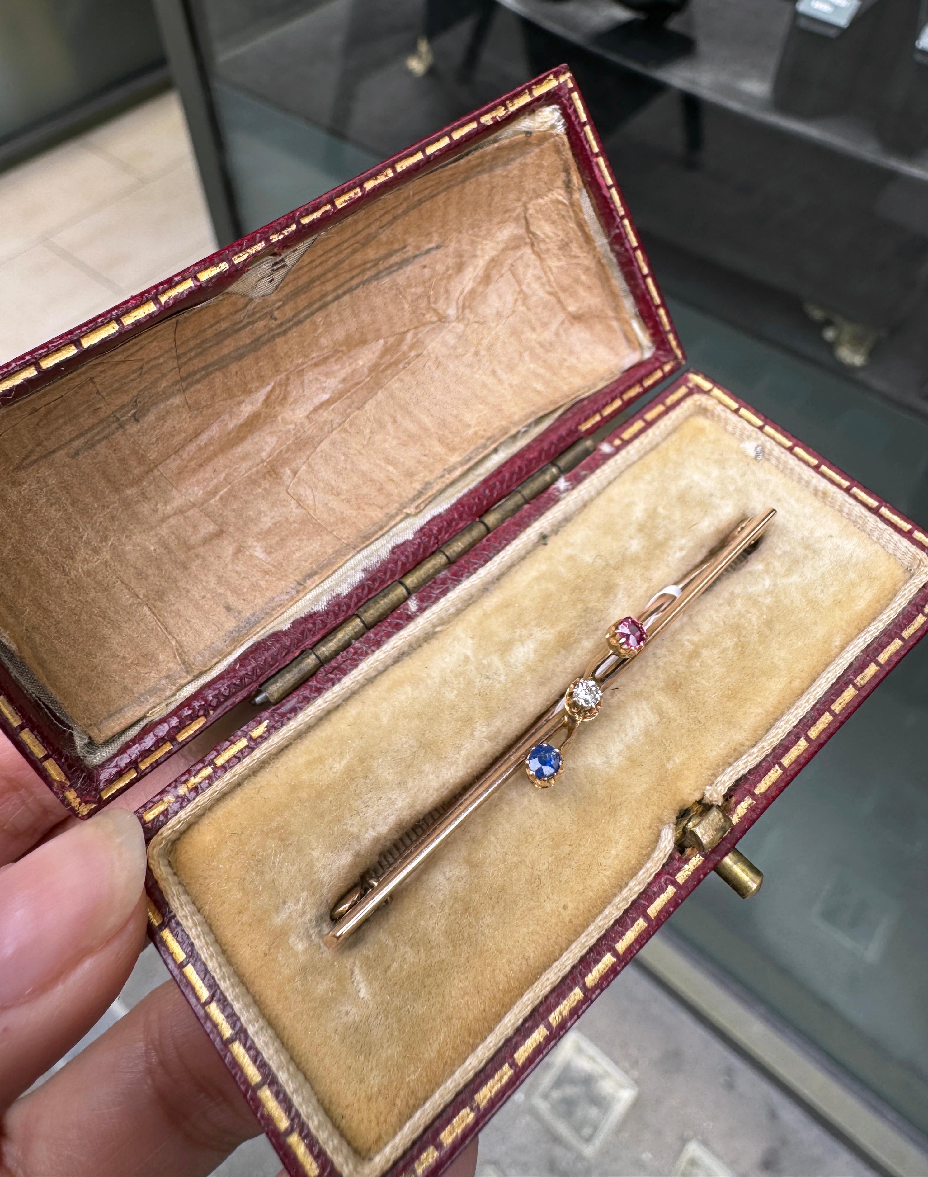 Round Cut Antique Diamond, Sapphire & Ruby 9 Carat Rose Gold Bar Brooch, c.1910 For Sale