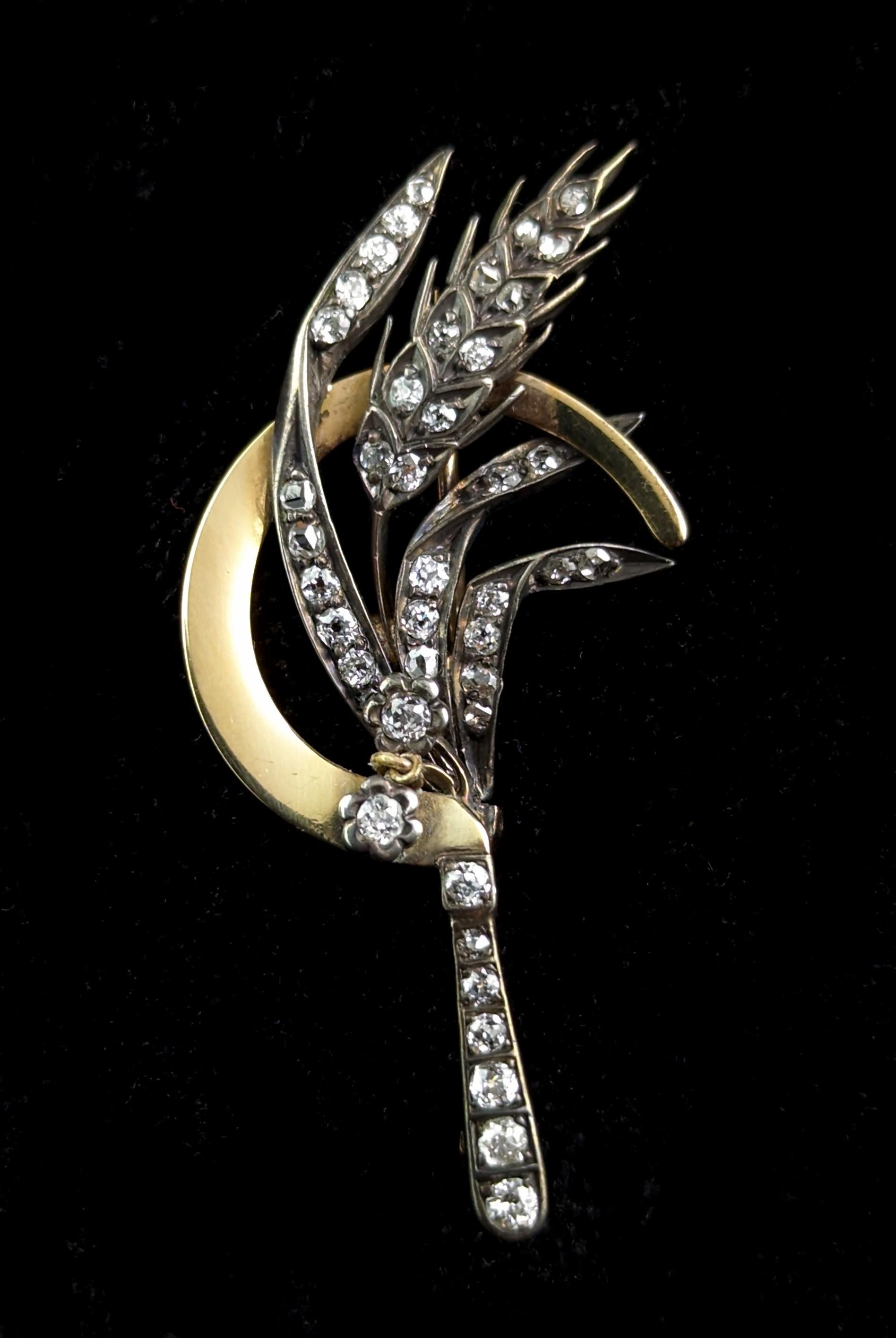 Steeped in symbolism and beauty this antique diamond Sickle and wheat brooch is such an interesting piece.

The sickle has many meanings throughout history and in Victorian jewellery.

The most common in this era were reaping the fruits of a good