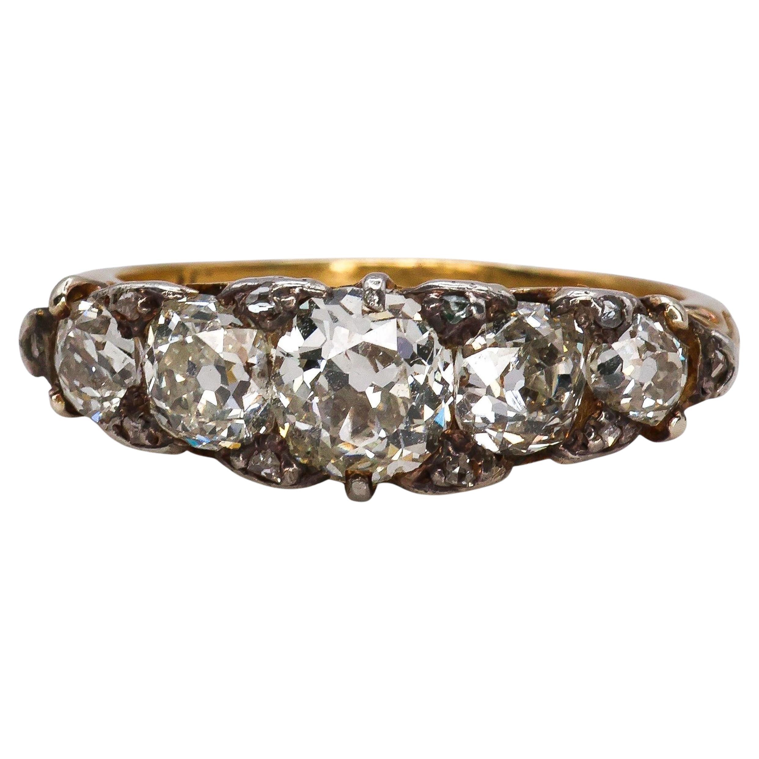 Antique Diamond, Silver and Gold Five Stone Carved Ring, Circa 1900