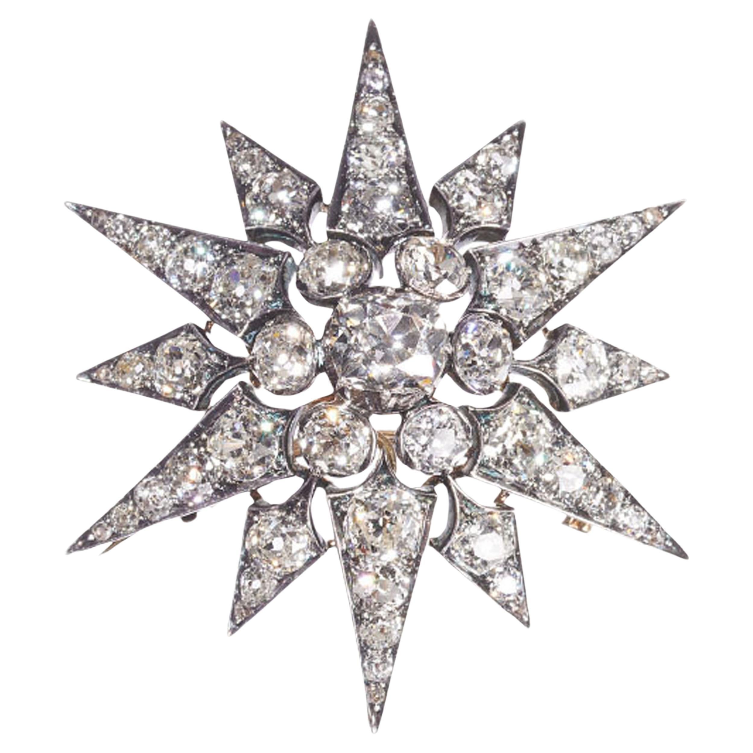 Antiguo broche de diamantes, plata y oro en forma de estrella de doce puntas, circa 1880, 11,26 quilates