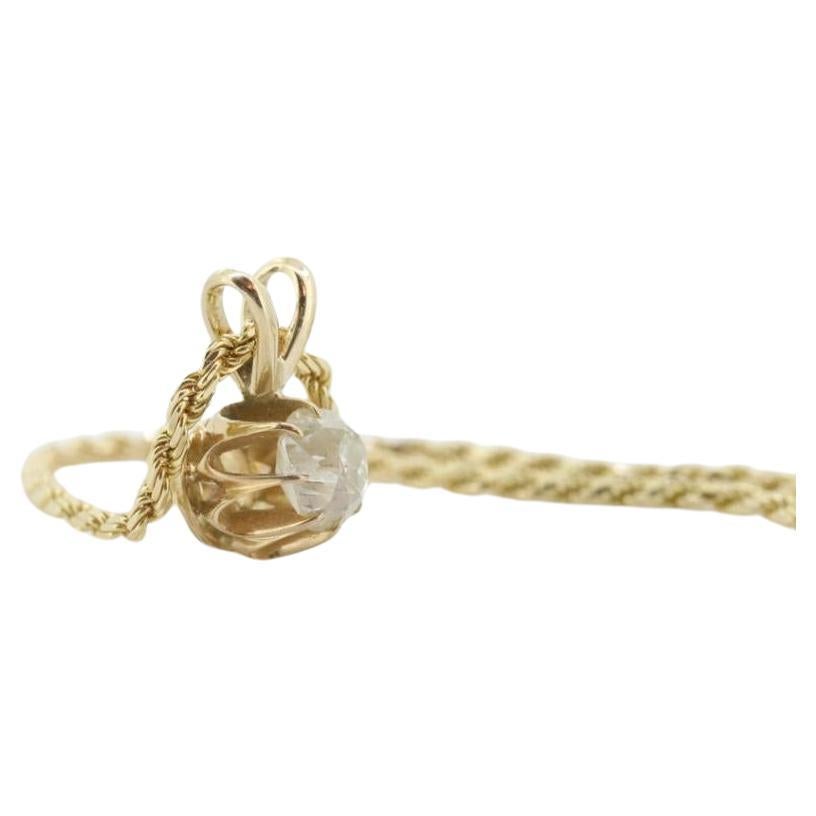 Antique Diamond solitaire pendant Buttercup setting. 14k Gold with a old mine