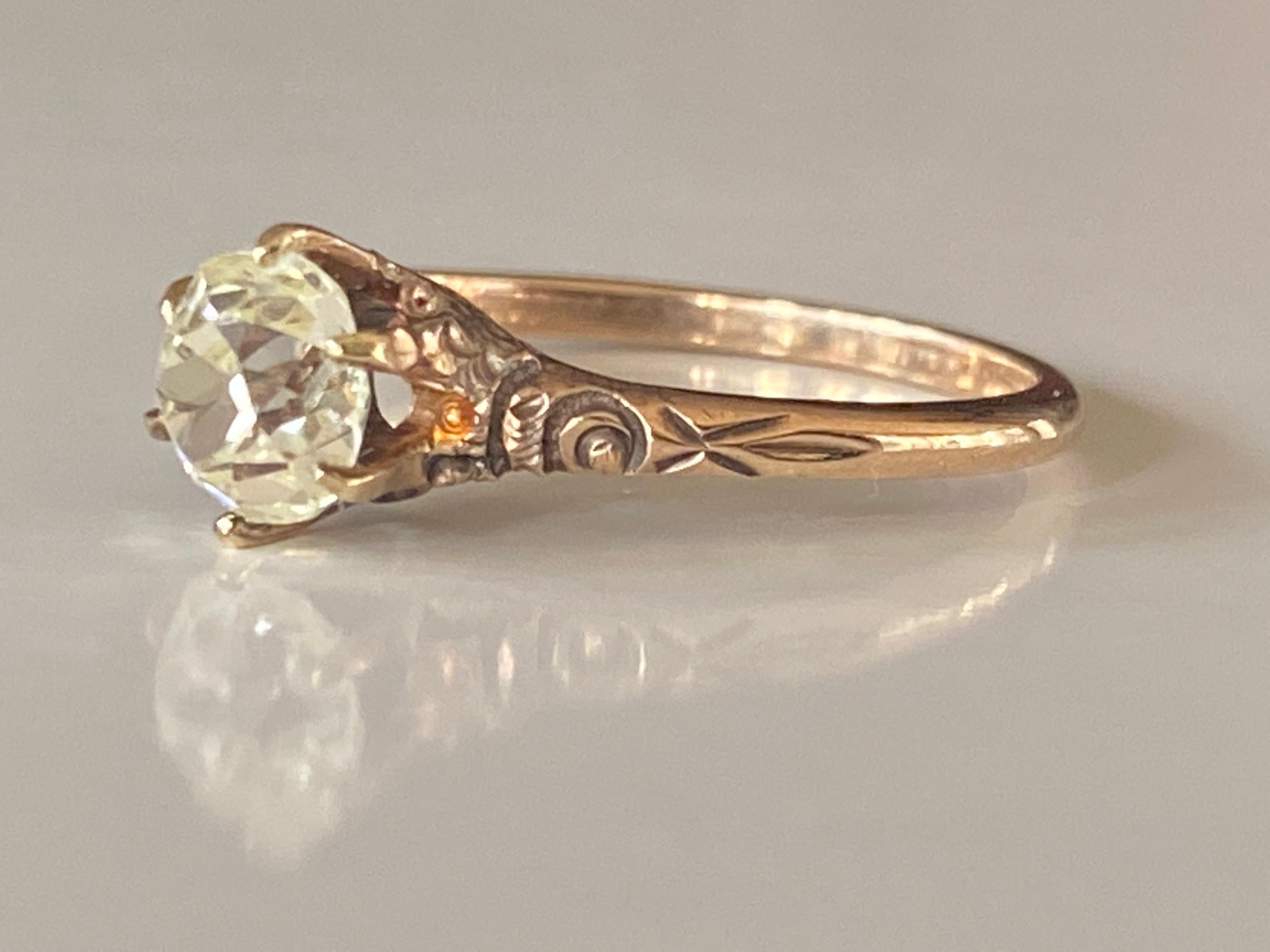 Crafted in 9kt yellow gold, this stunning antique Edwardian era ring is designed around a shimmering Old Mine cut center stone measuring approximately 1.10 carat, K-L color, SI2 clarity with delicate piercing. Circa 1900-1910. 
