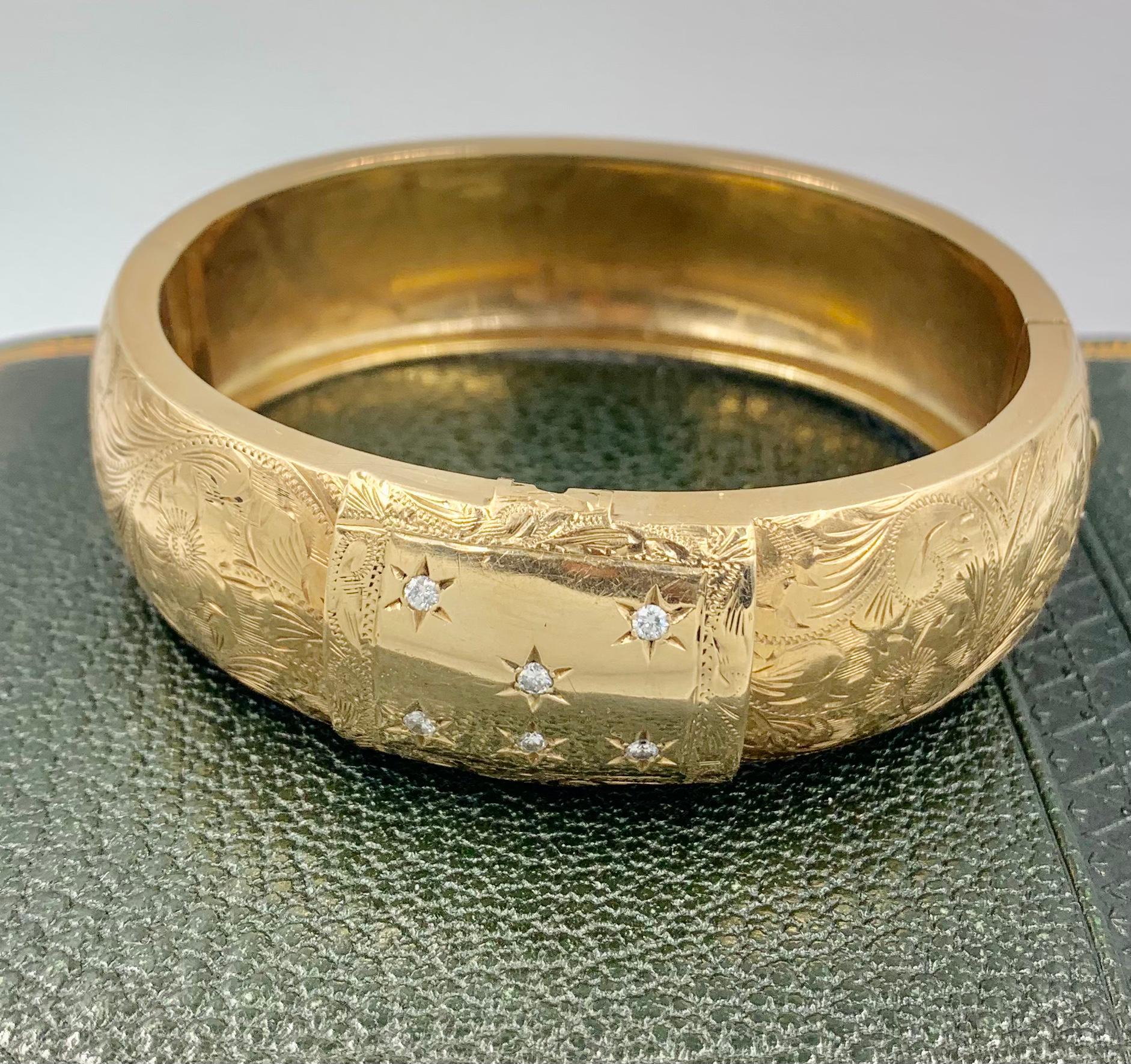 Romantic, heirloom quality, finely engraved 14k gold diamond bracelet with a central panel opening to a hidden locket compartment. The body of the bracelet is fully engraved with scrolled foliate and floral motifs. The central curved panel is set