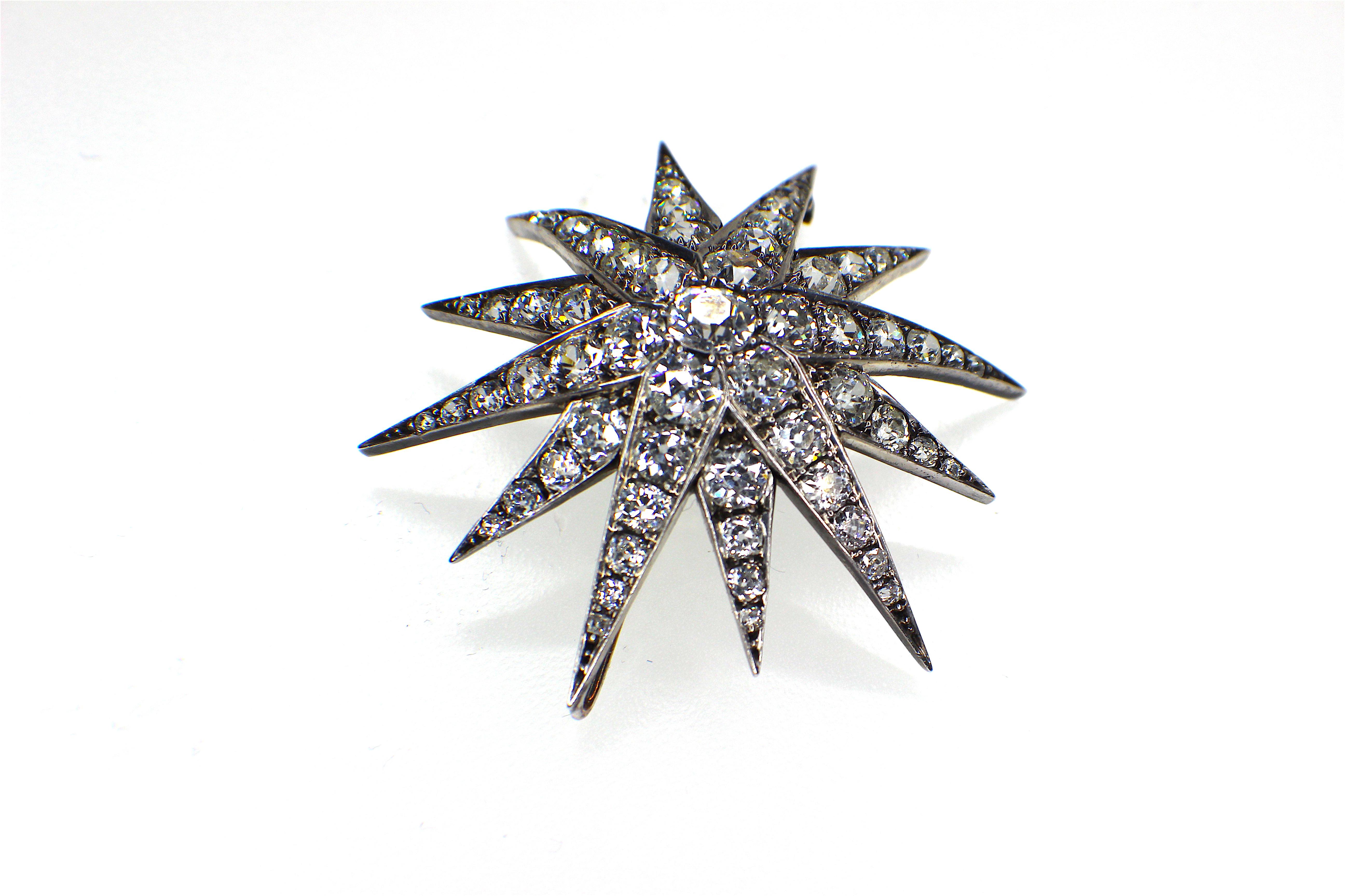 Antique Diamond Star Pendant. 1880s. 
The stars diameter is 5,4cm or 2.12 inches and total old european cut diamond weight is circa 13,2 to 14,1 estimated, 
all diamonds of very lovely bright niceThe middle 1.0ct diamonds is color F-H and clarity
