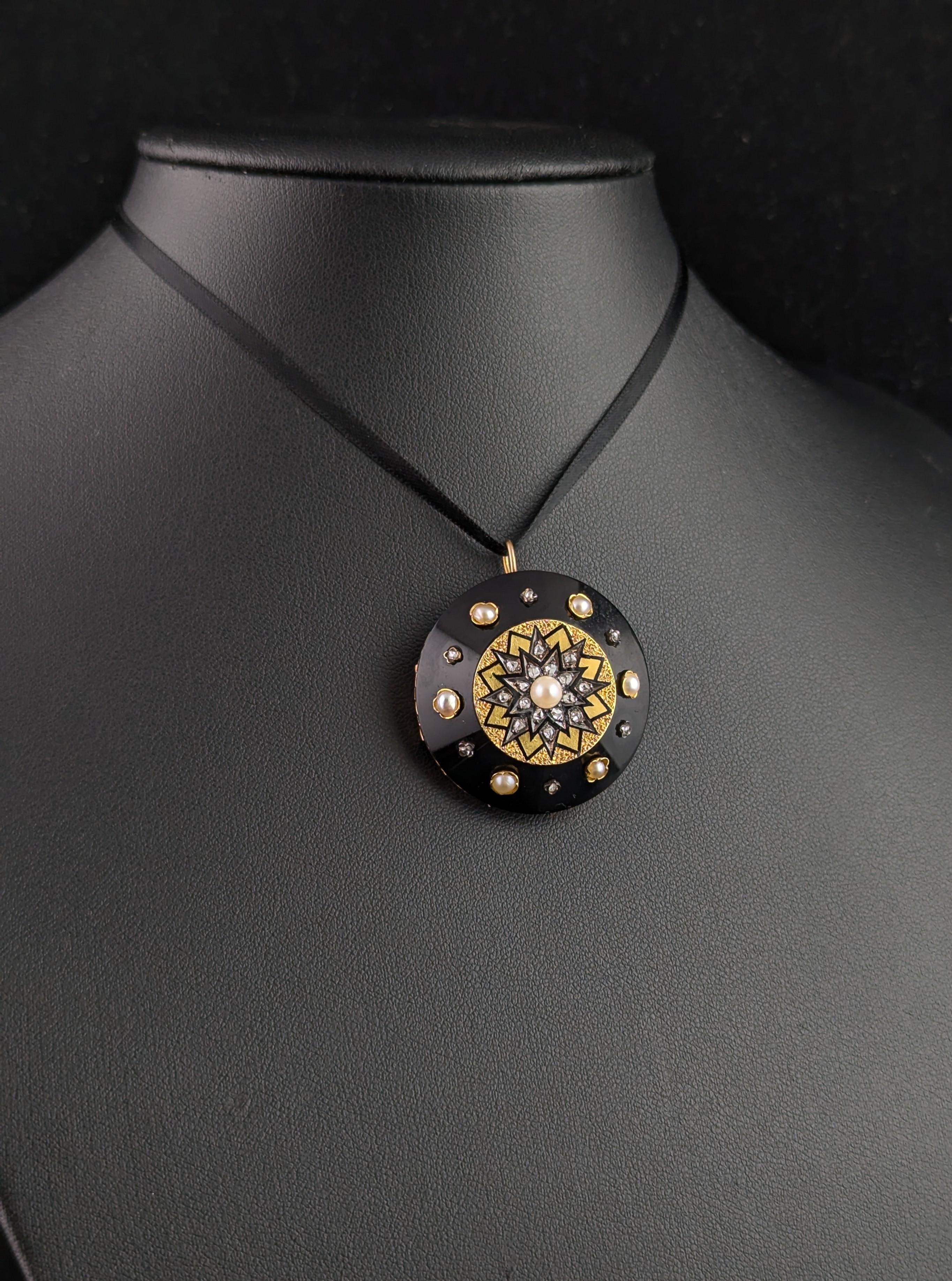 One of the most beautiful antique star pendant brooches I have ever seen.

She is dark and moody yet uplifting with the gorgeous rose cut diamond studded star to the centre, highlighted with black enamel on rich textured 15ct yellow gold.

To the