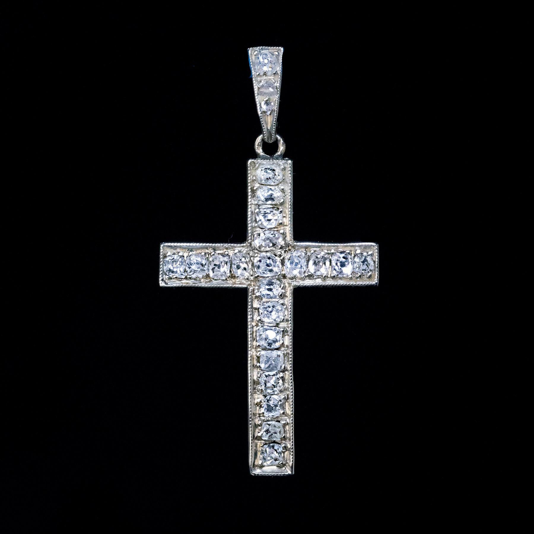 Donna Ciondolo a croce in oro bianco con diamante antico