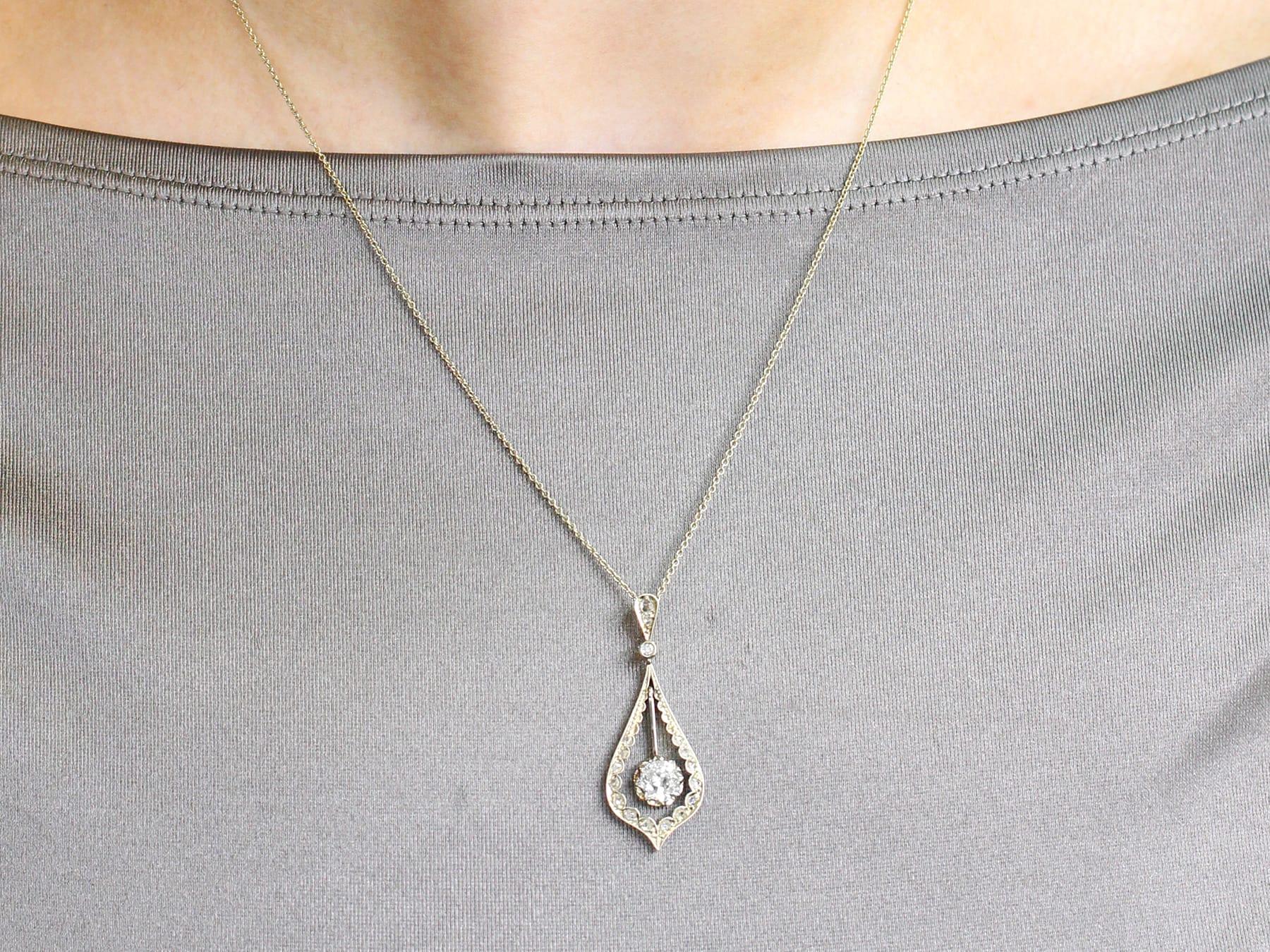 Taille vieille Europe Pendentif ancien en or jaune et or blanc serti de diamants, c. 1910 en vente