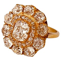 Antique Diamonds Cluster Ring With Central Old-Cut Cushion Weighing 1.35cts