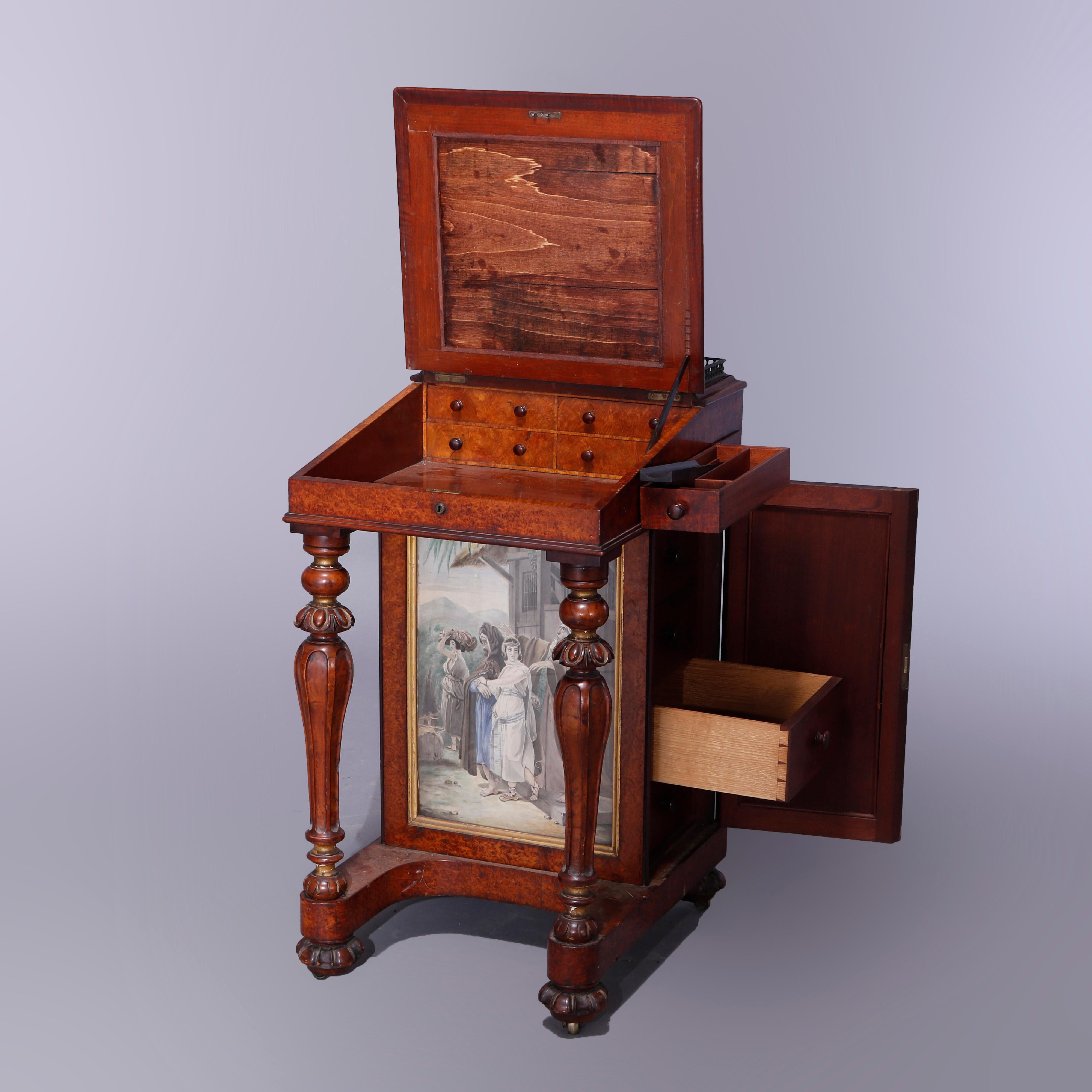 An antique diminutive davenport desk offers burl and mahogany construction with upper pierced bronze gallery over slant front desk having watercolor Persian genre scenes (including woman at the well), gilt trim, drawers, and carved balustrade