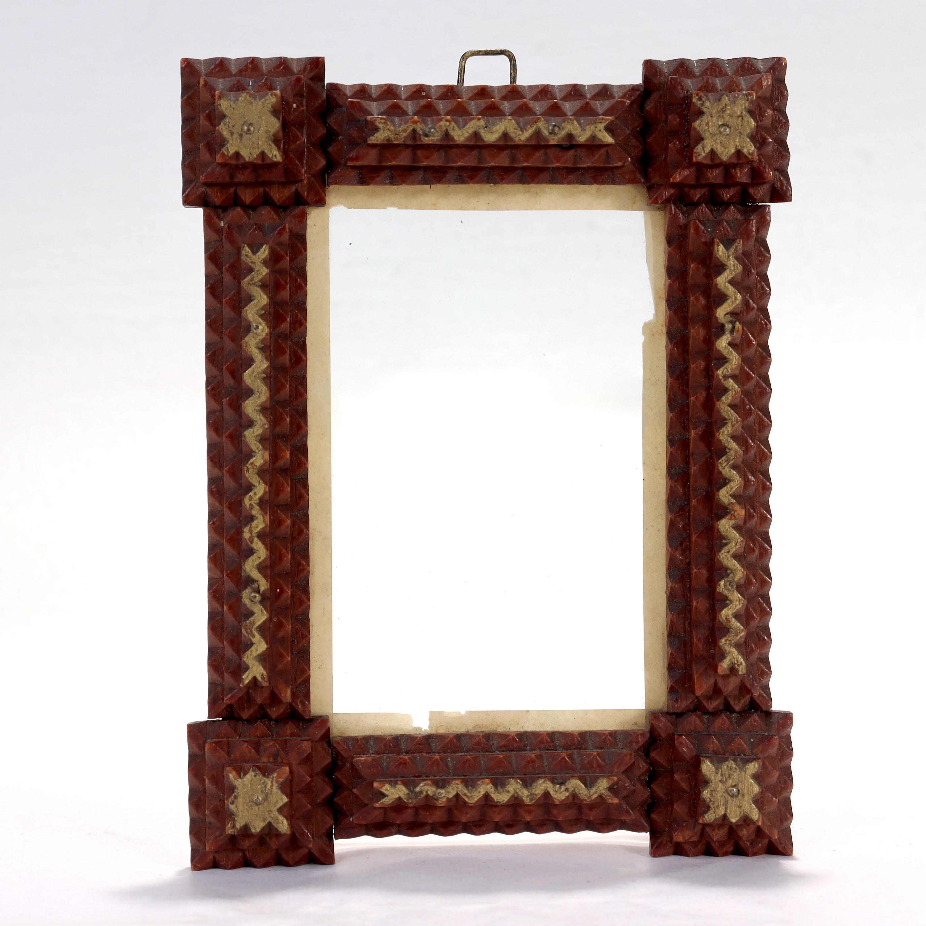 A fine diminutive Tramp Art picture frame.

With a crazed red wash and gold highlights.

Found in a Pennsylvania estate.

Simply a great piece of folk art! 

Date:
20th Century

Overall Condition:
Not retaining glass or a back. It is in