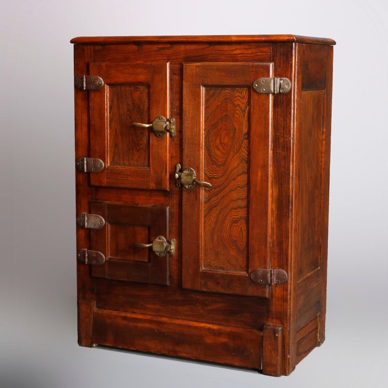 Antique Diminutive ThreeDoor Paneled Oak Ice Box, circa 1900 at