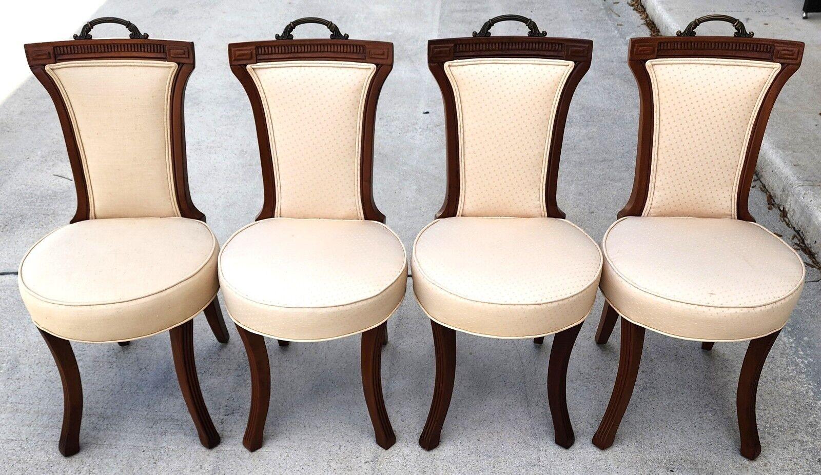 For FULL item description click on CONTINUE READING at the bottom of this page.

Offering One Of Our Recent Palm Beach Estate Fine Furniture Acquisitions Of A
Set of 4 Antique Dining Chairs with Brass handles for moving.

Note: 1 chair has a