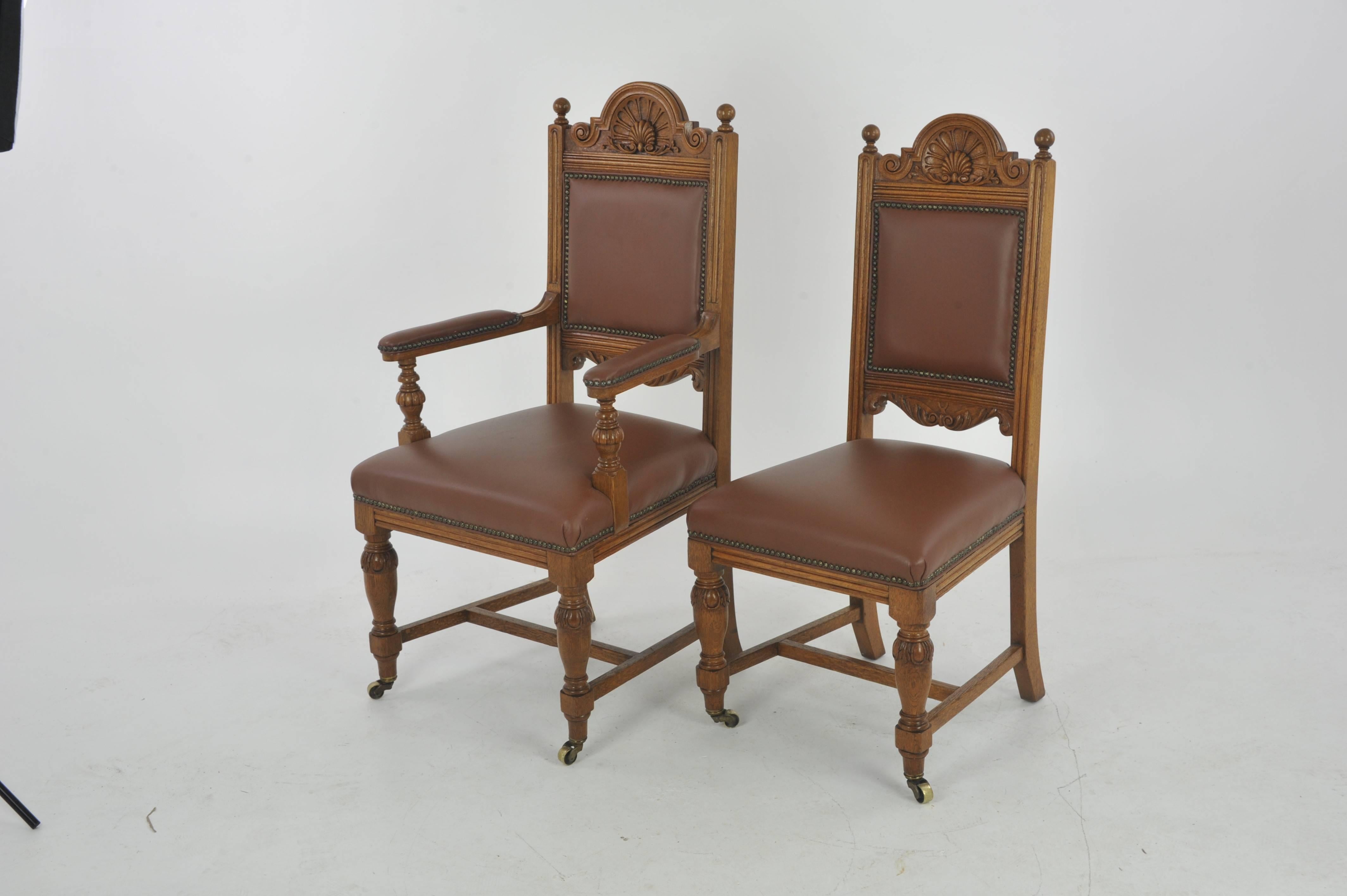 Antique dining chairs, carved oak, six chairs (5+1), Scotland, 1880, B1126.

Scotland, 1880.
Solid oak construction
Original finish
Five single and one armchair
Carved crest rail above
Padded back with vinyl upholstery
Upholstered