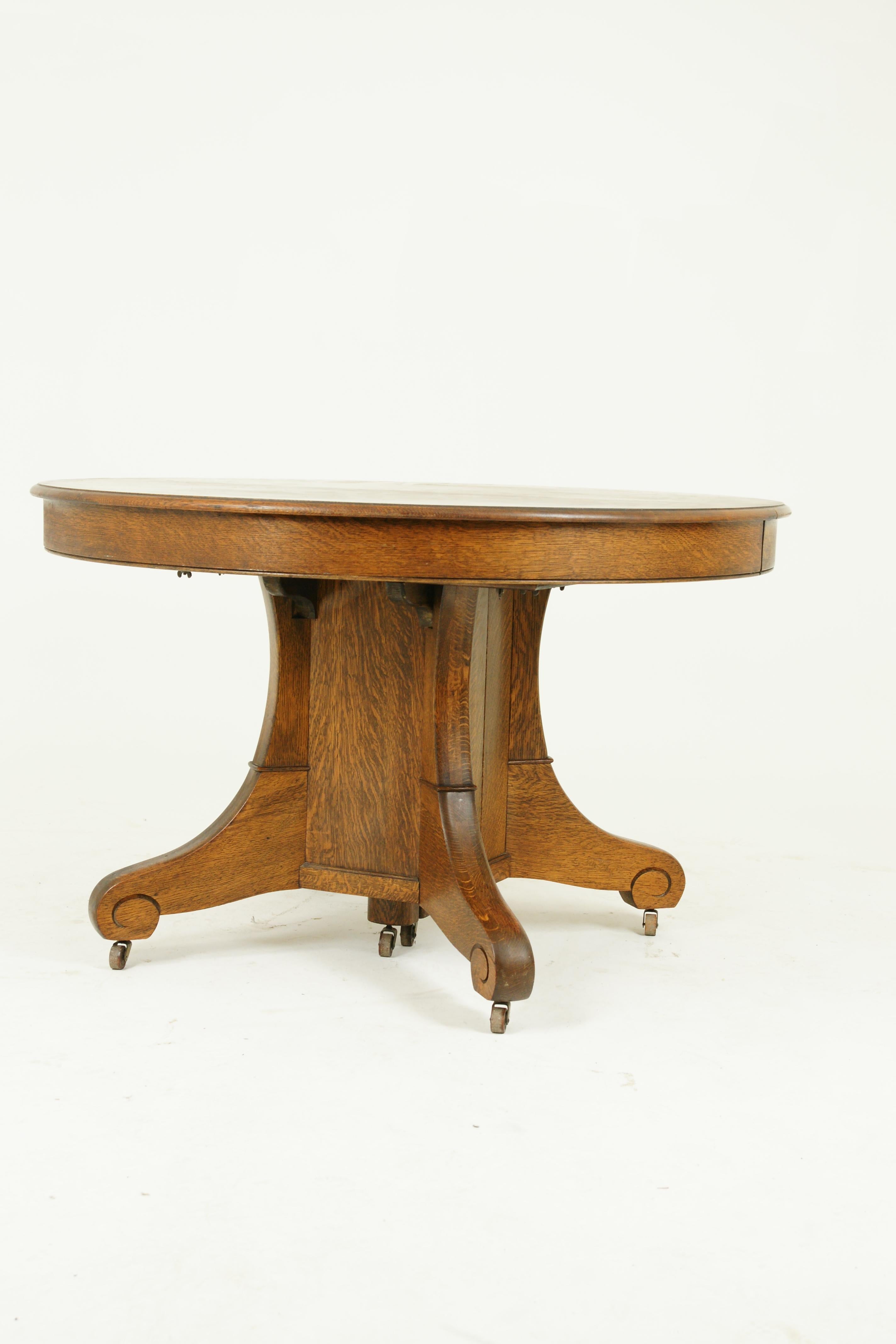 Antique dining table, pedestal table, vintage oak table, Canada, 1900, Antique Furniture, B1496

Canada 1900
Tiger oak construction
Circular top with two original leaves
Sitting on a split pedestal base below
Original castors
Table extends to