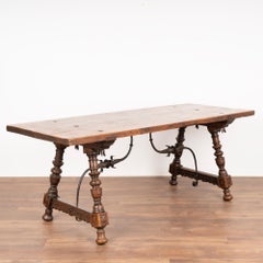 Antique Dining Table with Turned Legs and Scrolled Iron Stretcher from Spain