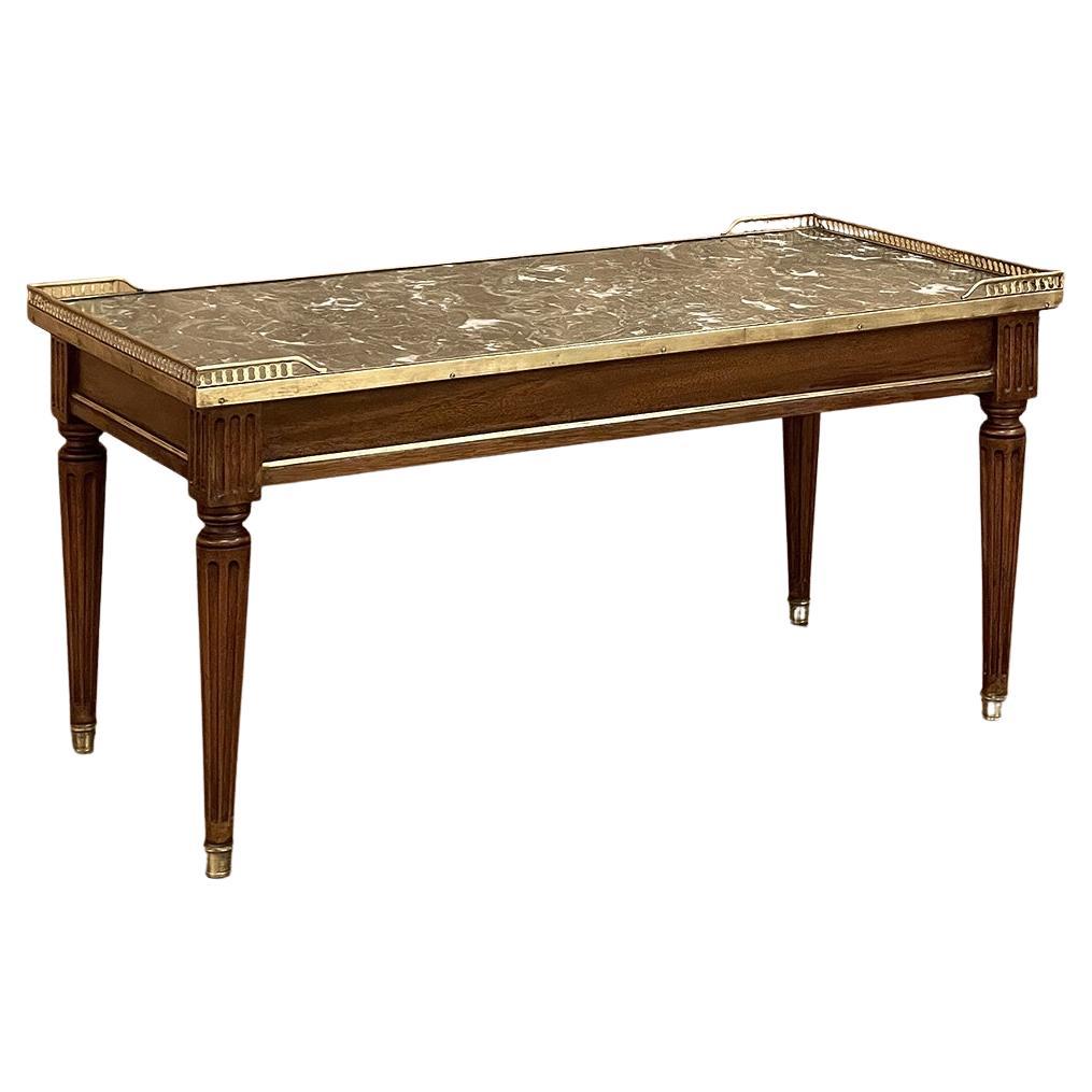 Ancienne table basse de style Directoire à plateau en marbre