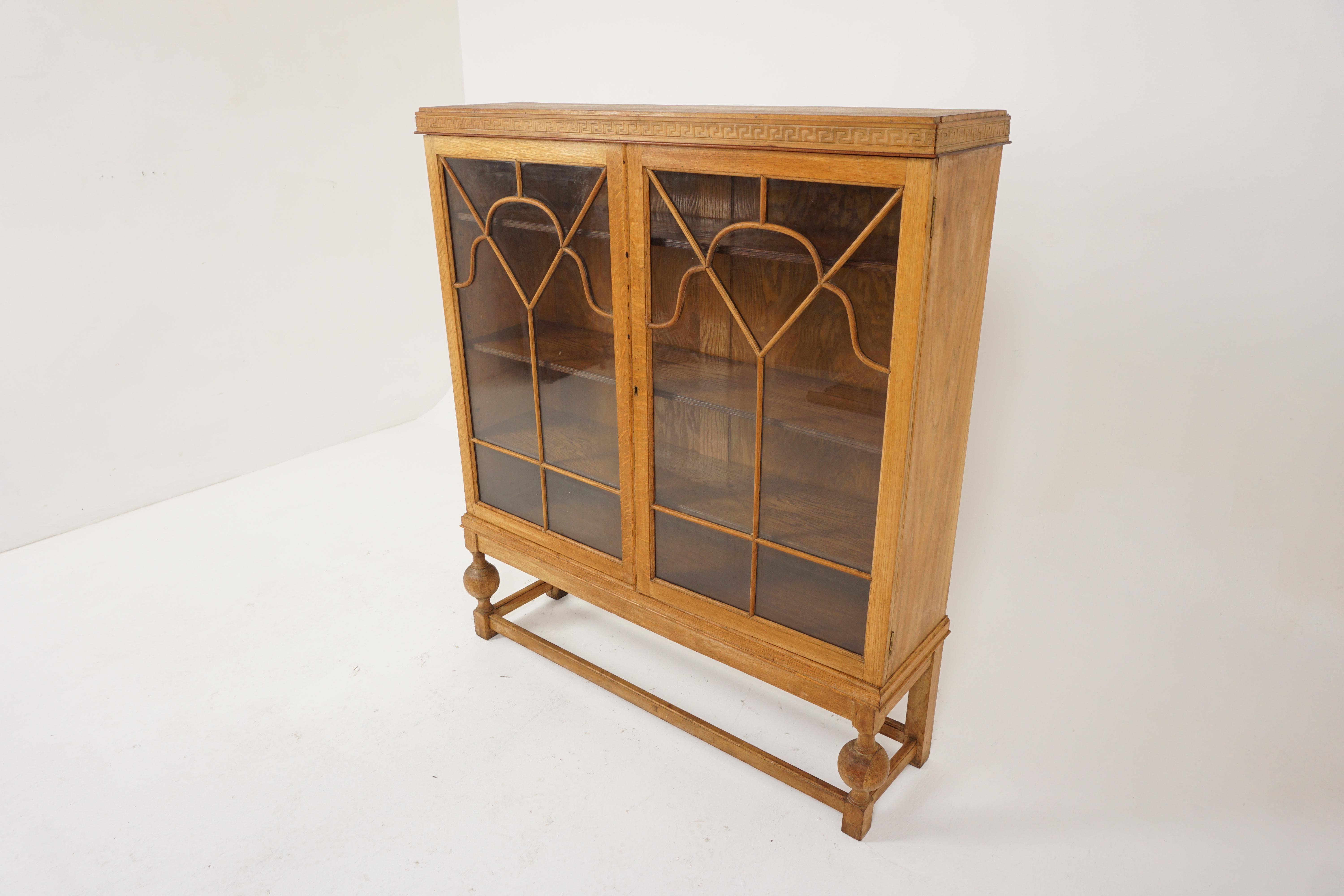 Antique display cabinet, golden tiger oak, bookcase, Scotland 1920, B2605

Scotland 1920
Solid oak 
Original finish
Rectangular top
Pair of original glass doors 
With moulding to the front
Fitted with three adjustable wooden