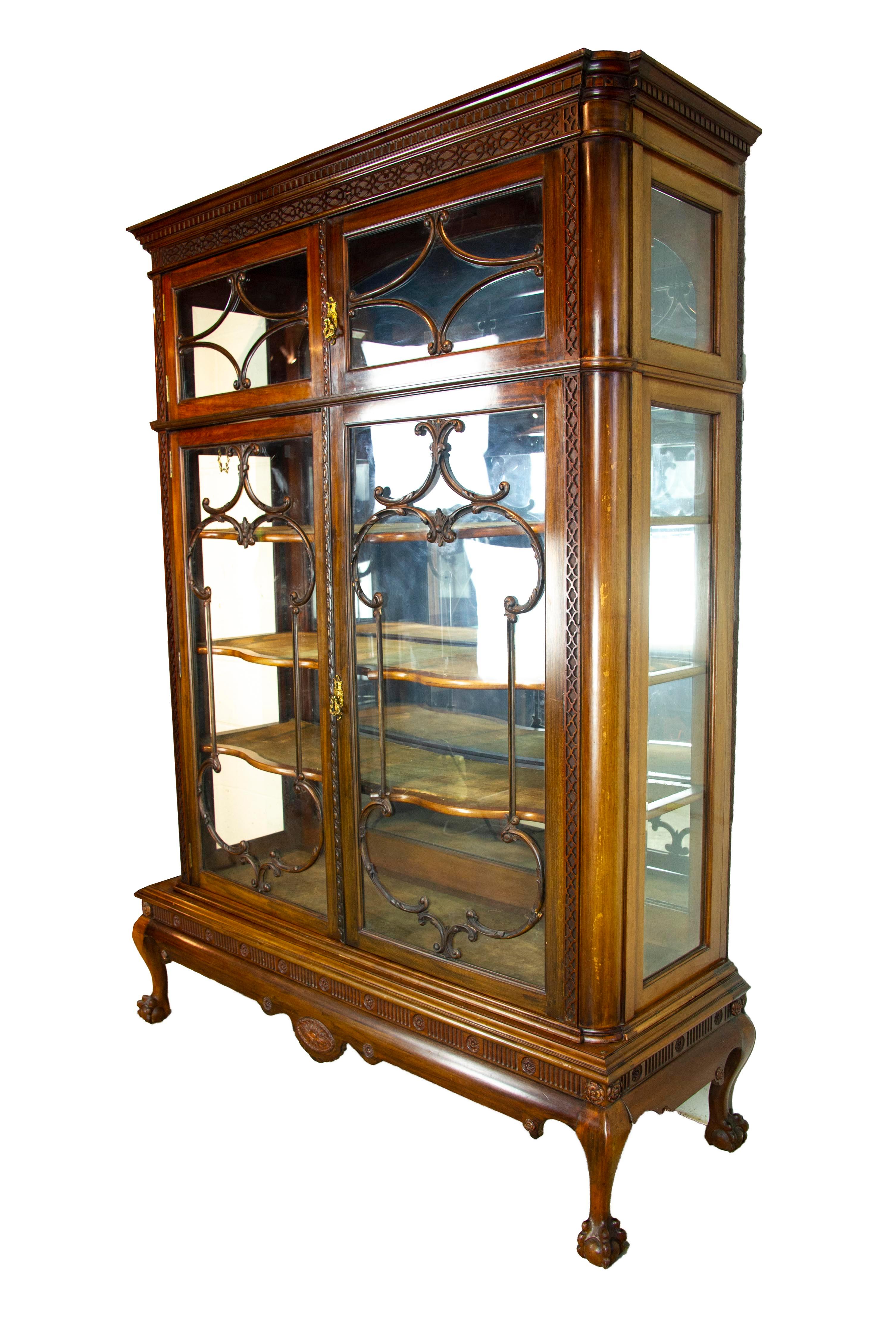 Antique display cabinet, walnut display, China cabinet, Antiques Furniture, Scotland 1920, H042

Scotland, 1920
Solid walnut with original finish
Dentil cornice
Fretwork frieze above
Pair of short glass doors with fretwork and original brass
