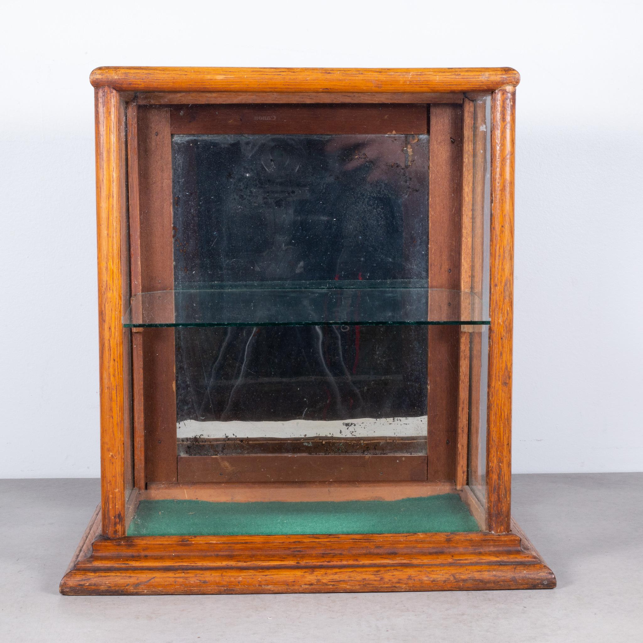About:

An antique small display case with all original glass, mirror and latch. The glass shelf is removable for displaying larger items.

 Creator: Unknown.
 Date of Manufacture: circa 1900-1920.
 Materials and techniques: oak, metal,