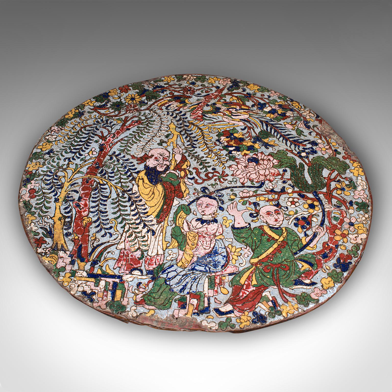 This is an antique display plate. An Oriental, cloisonné plaque in Qing dynasty taste, dating to the mid 18th century, circa 1750. An engaging example of early Chinese cloisonné work, it displays charming naivety and time-worn appeal, sure to