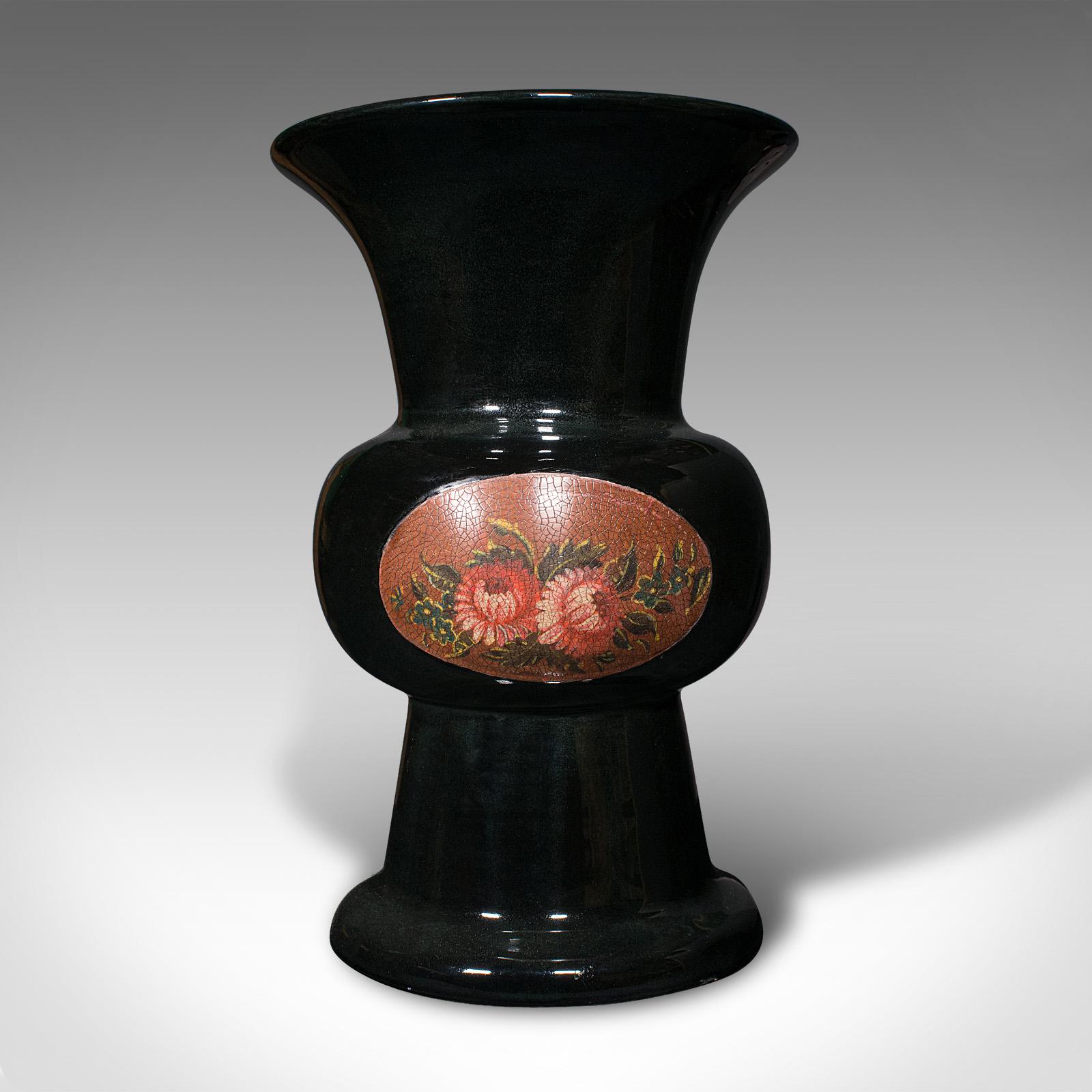 This is an antique display vase. An English ceramic flower urn in ritual vase form, dating to the Edwardian period, circa 1910.

Pleasingly decorative display vase with distinctive form
Displaying a desirable aged patina and in good order
Deep