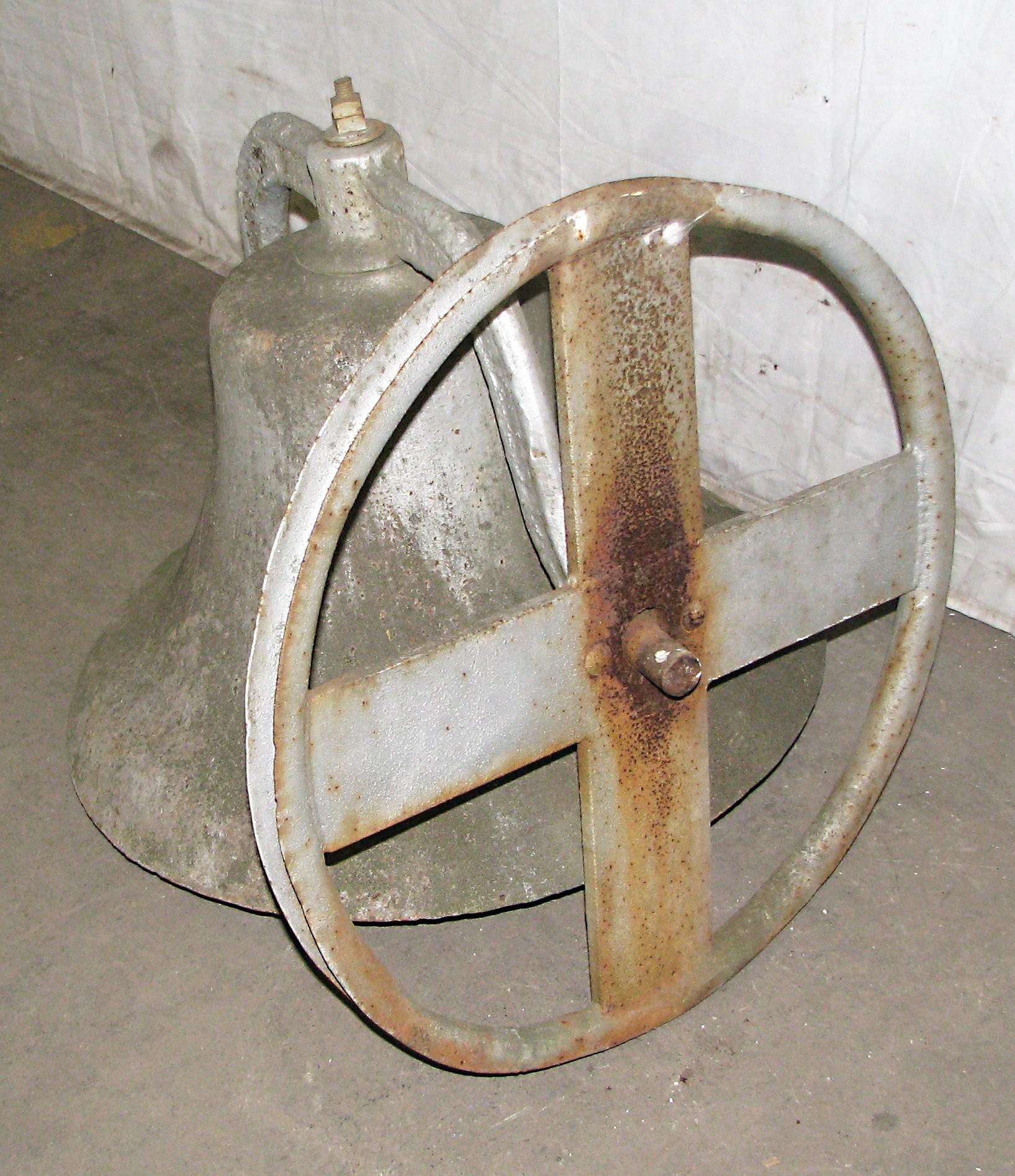 Antique distressed cast iron church bell. The clapper is in need of restoration but still lets off a warm but loud sound. This can be seen at our 400 Gilligan St location in Scranton, PA. Measures: 22 in. Diameter.