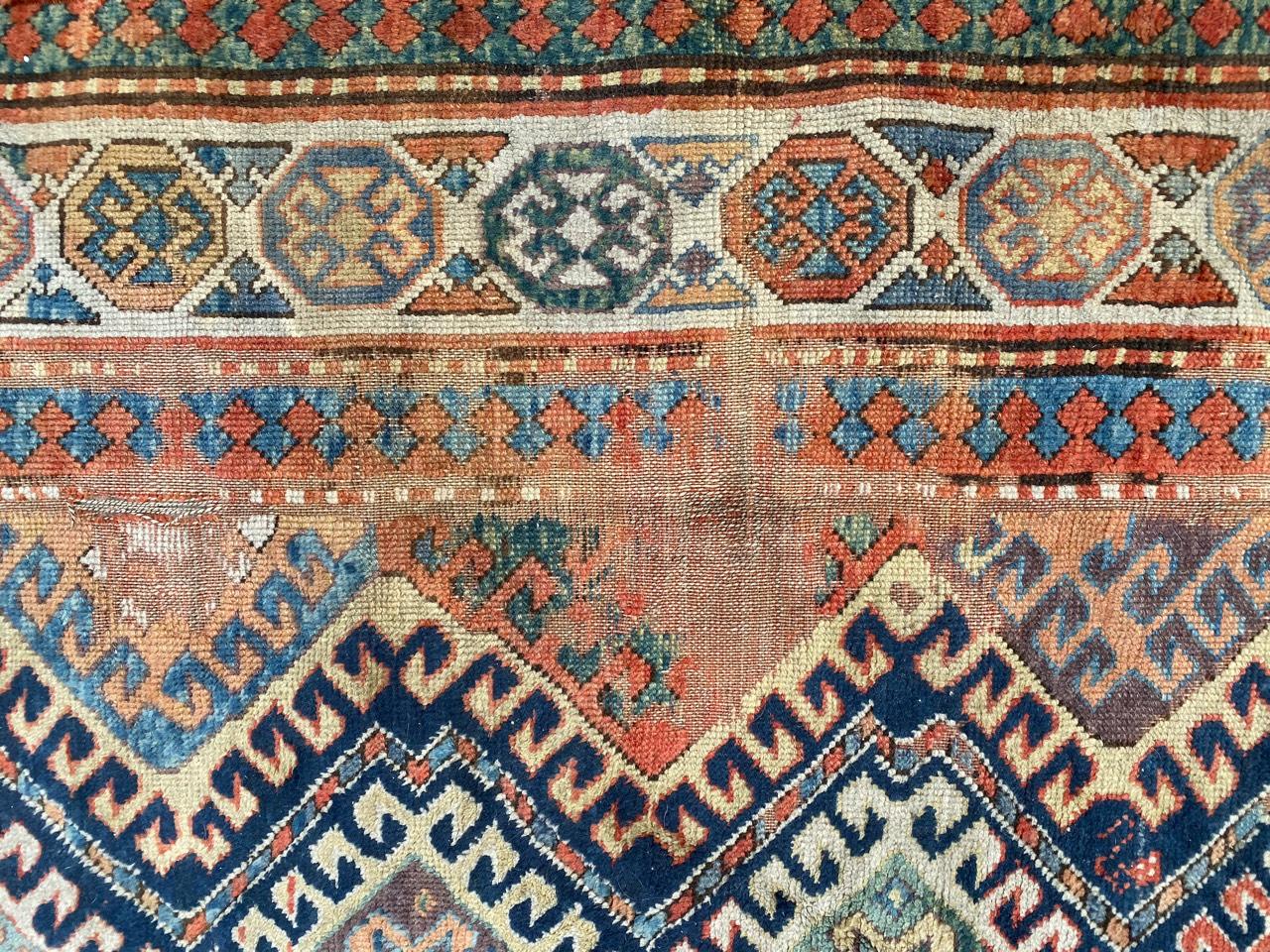 Antique Distressed Caucasian Kazak Rug In Distressed Condition In Saint Ouen, FR