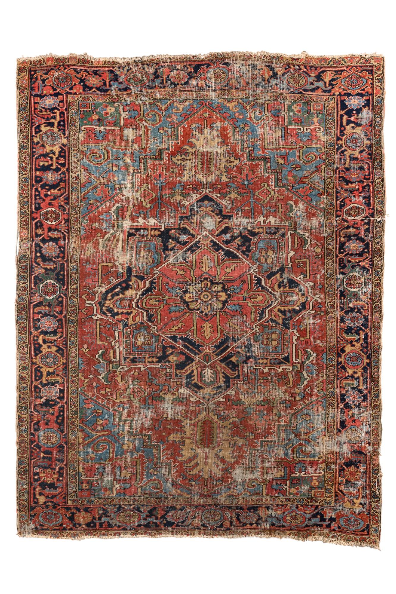 This antique Heriz rug, sized 7'7