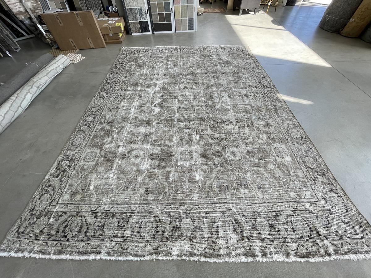 This Antique Distressed Mahal is an all wool Handmade and Hand knotted rug. It has an all over design from the 20th century and was made in Iran. The name is derived from the Mahallat village where the rugs were crafted, and they are characterized