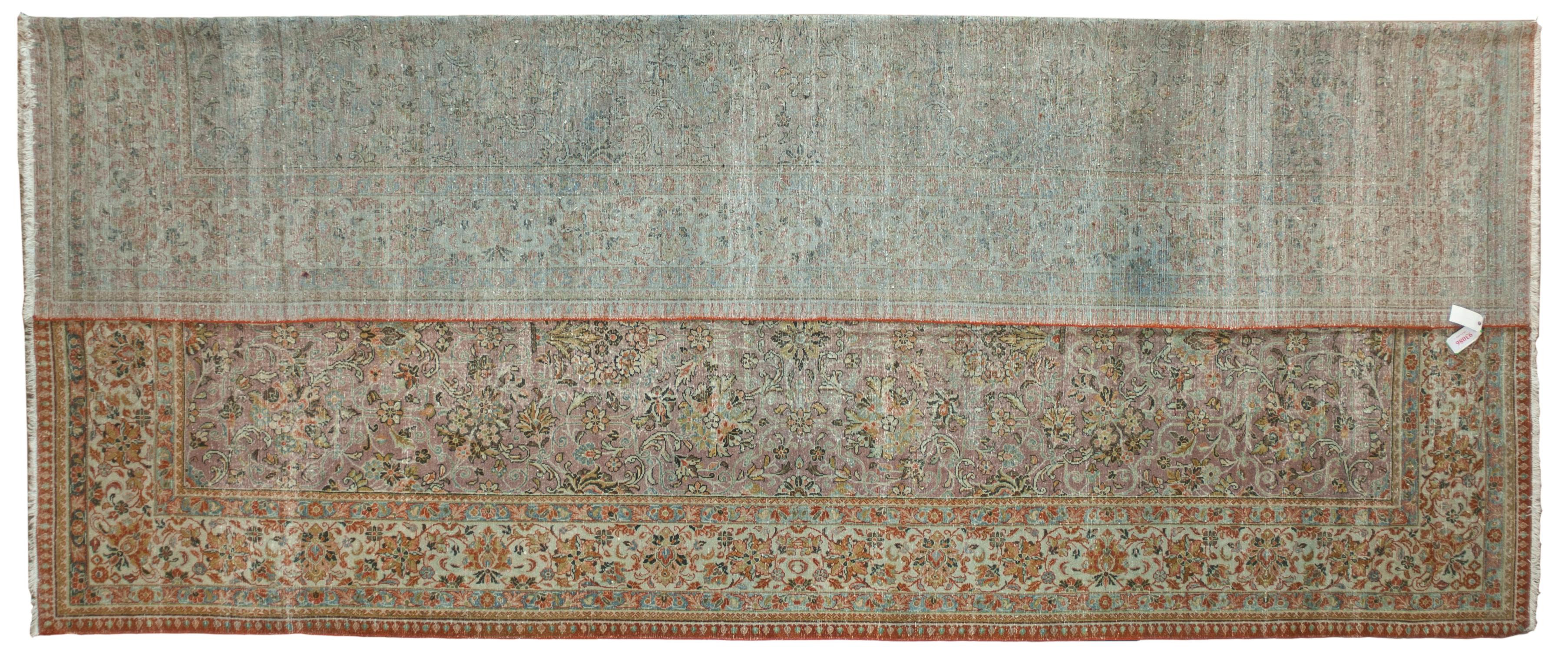 This antique distressed mahal is an all wool Handmade and Hand knotted rug. It has an all over design from the 20th century and was made in Iran. The name is derived from the Mahallat village where the rugs were crafted, and they are characterized