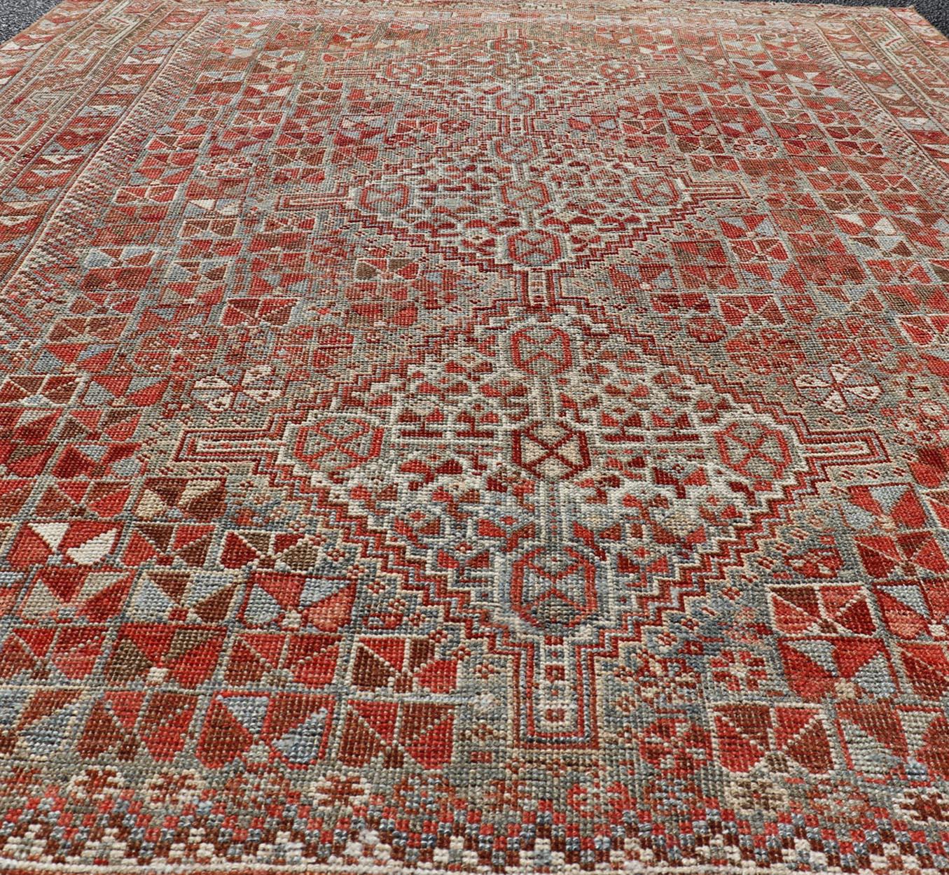Antique Distressed Persian Medallion Shiraz Rug in Shades Rusty Red & Steel Blue For Sale 2