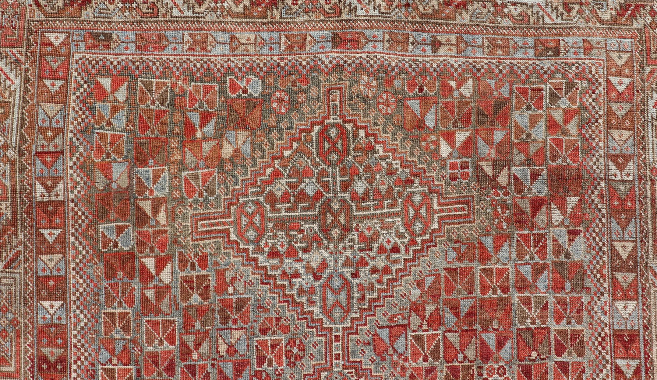 Antique Distressed Persian Medallion Shiraz Rug in Shades Rusty Red & Steel Blue For Sale 4