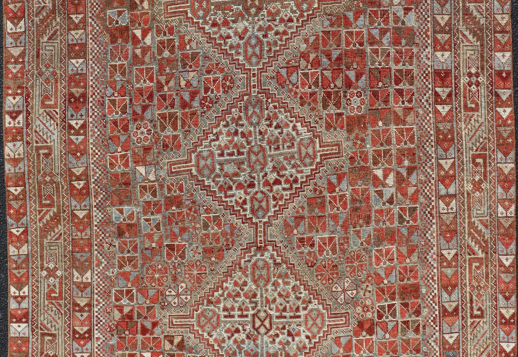 Hand-Knotted Antique Distressed Persian Medallion Shiraz Rug in Shades Rusty Red & Steel Blue For Sale