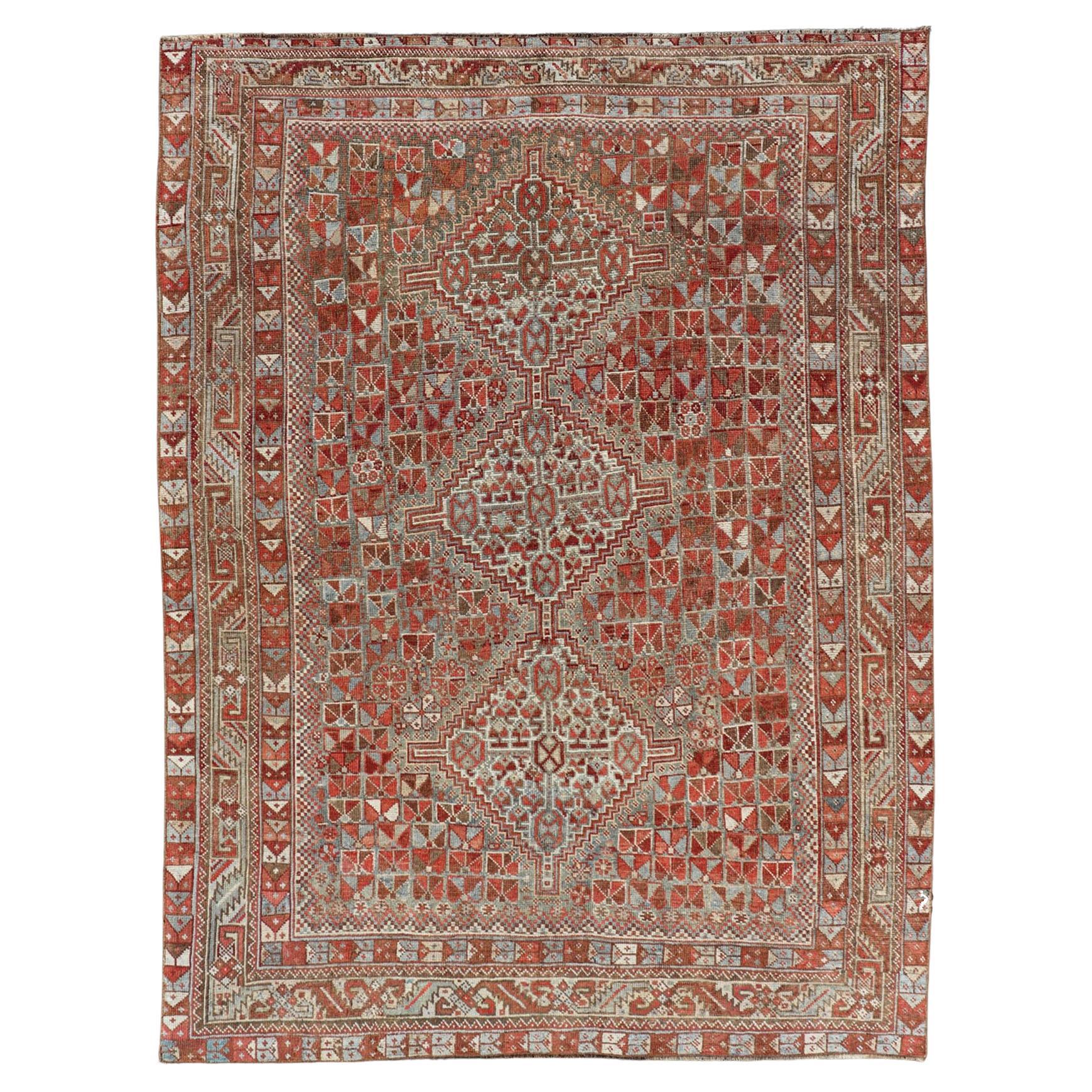 Antique Distressed Persian Medallion Shiraz Rug in Shades Rusty Red & Steel Blue For Sale