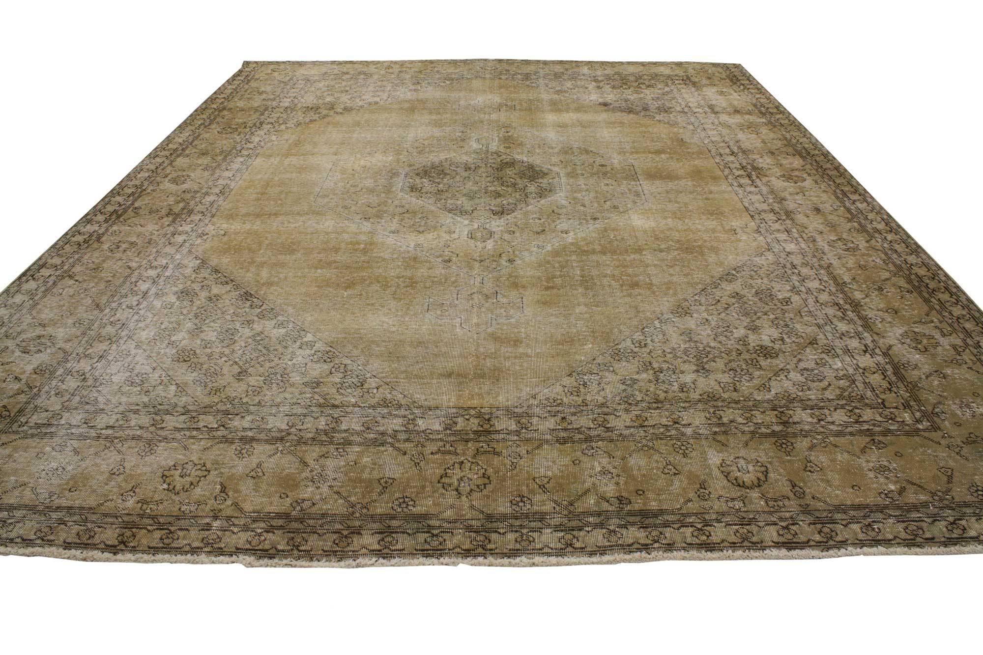80309 antique distressed Persian Tabriz area rug with modern Industrial style. This distressed Persian Tabriz rug with modern Industrial style features a large floating diamond medallion in rich waves of abrashed mocha. Spandrels echo the palette of