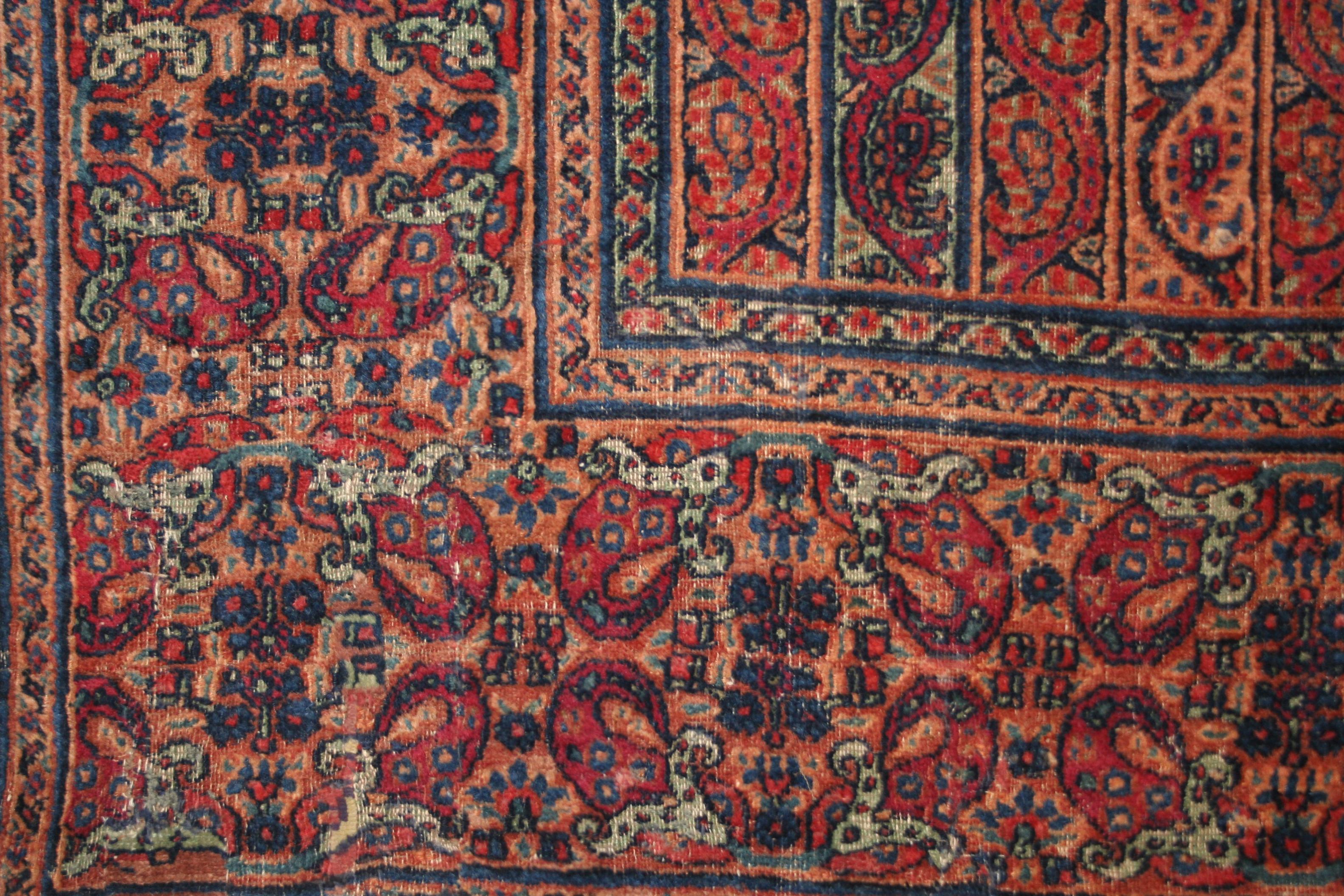 Antique Distressed Qajar Period Gallery Size Carpet with Kashmir Shawl Pattern In Distressed Condition For Sale In Milan, IT