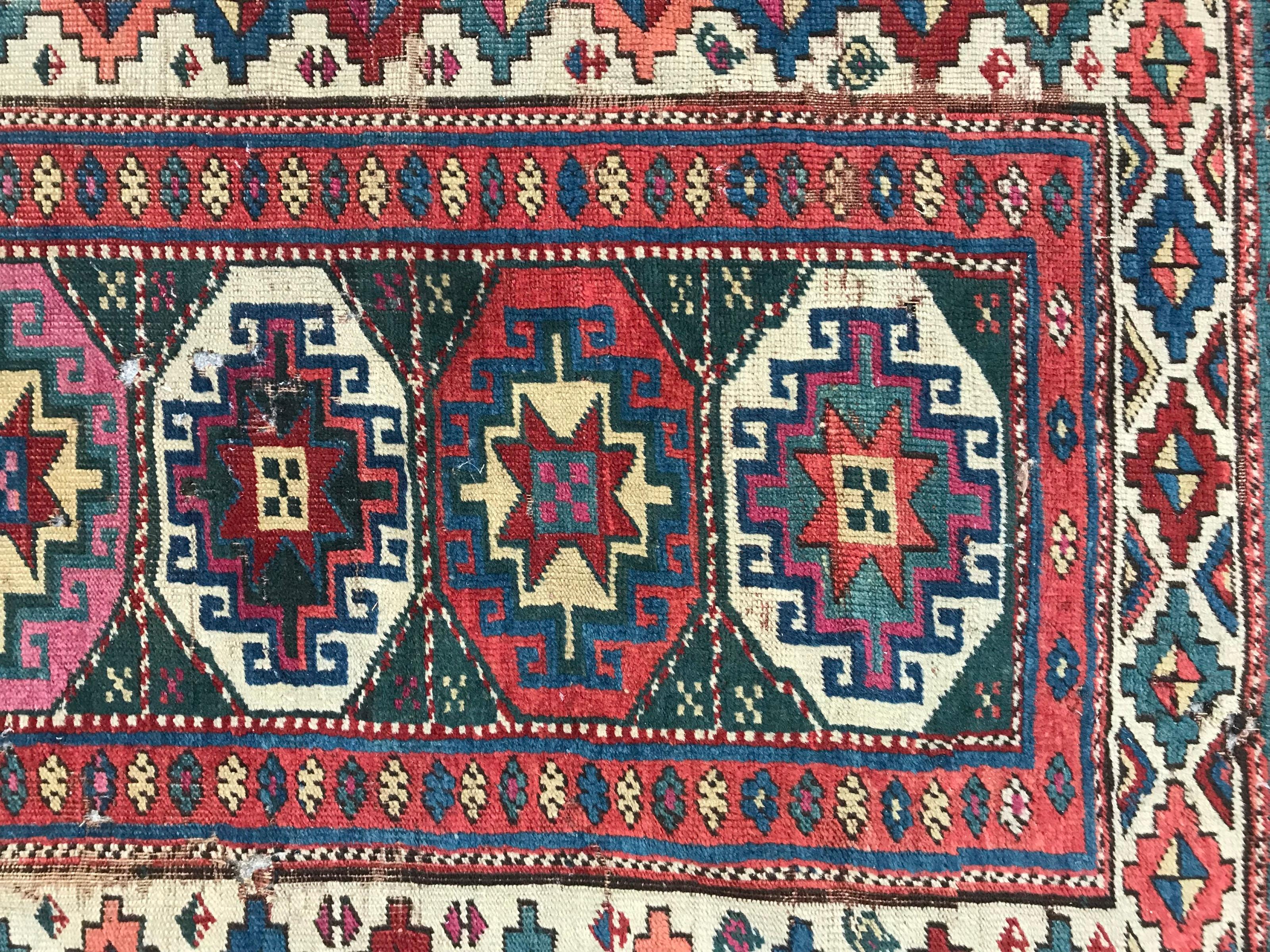 Late 19th century shirwan runner with beautiful geometrical Moghan Kazak rugs and natural colors. Damaged, wool velvet on wool foundation.