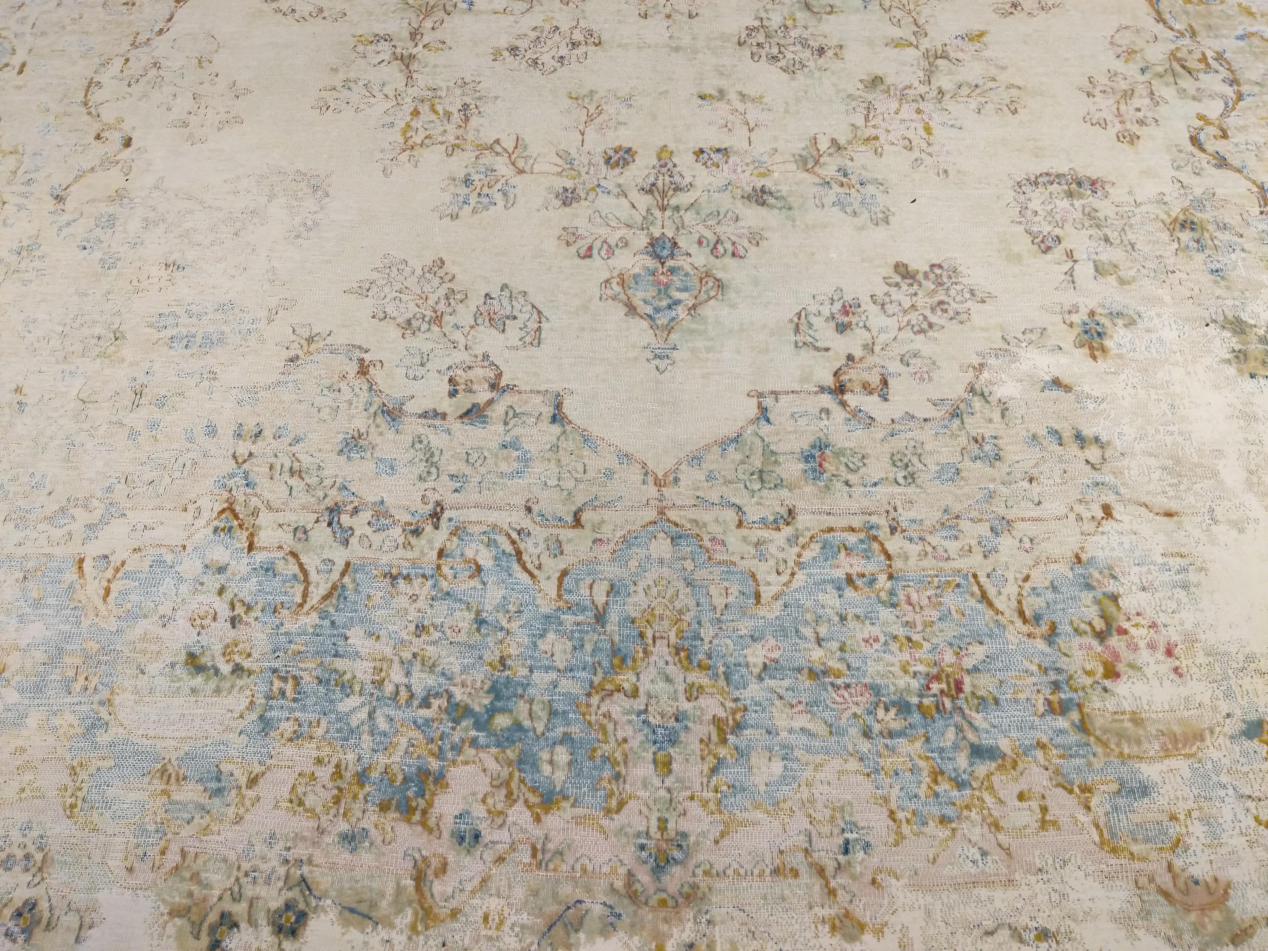 Antique Distressed Soft Coloured Botanical Design Decorative Carpet For Sale 2