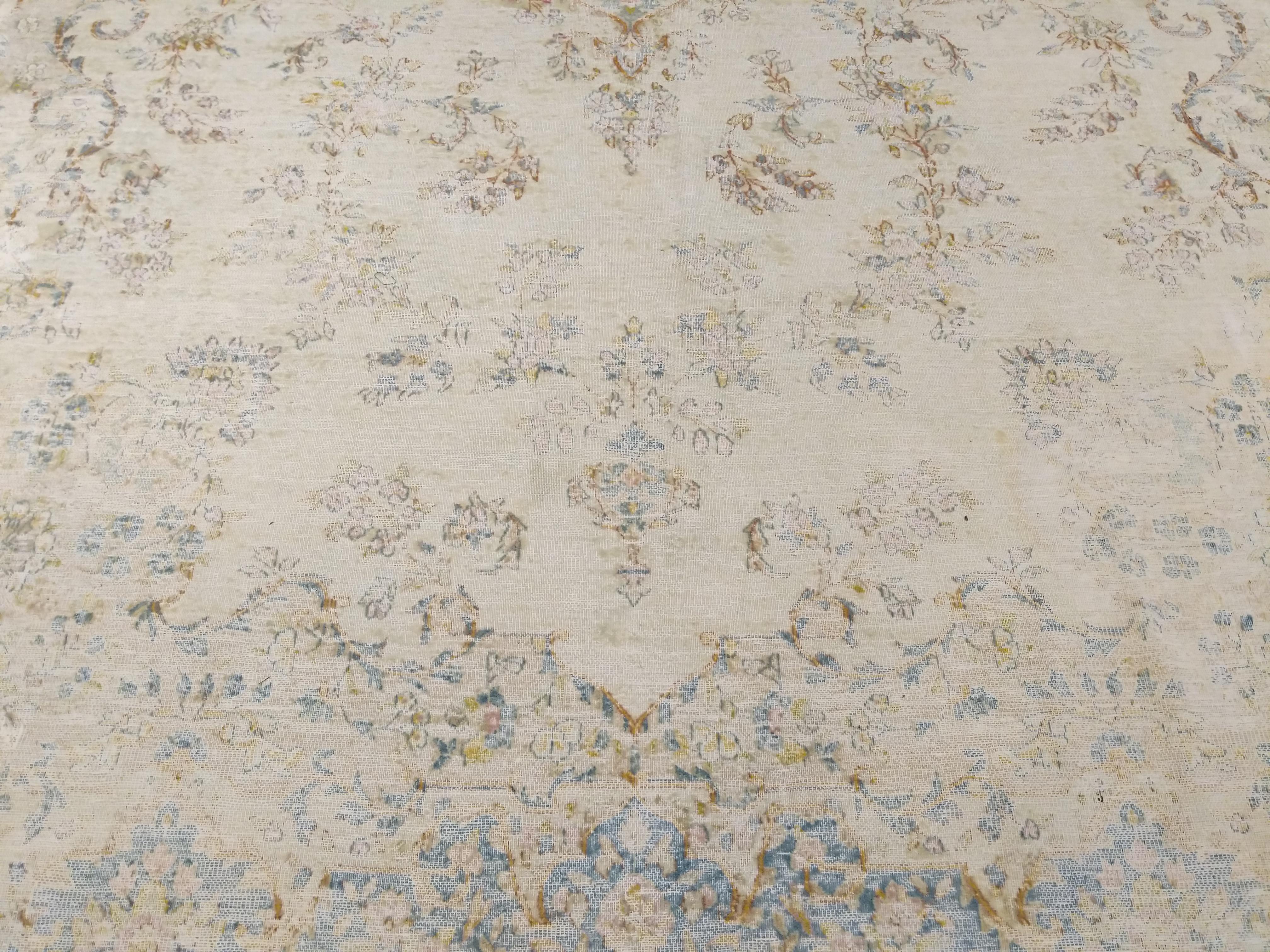 Oushak Antique Distressed Soft Coloured Botanical Design Decorative Carpet For Sale
