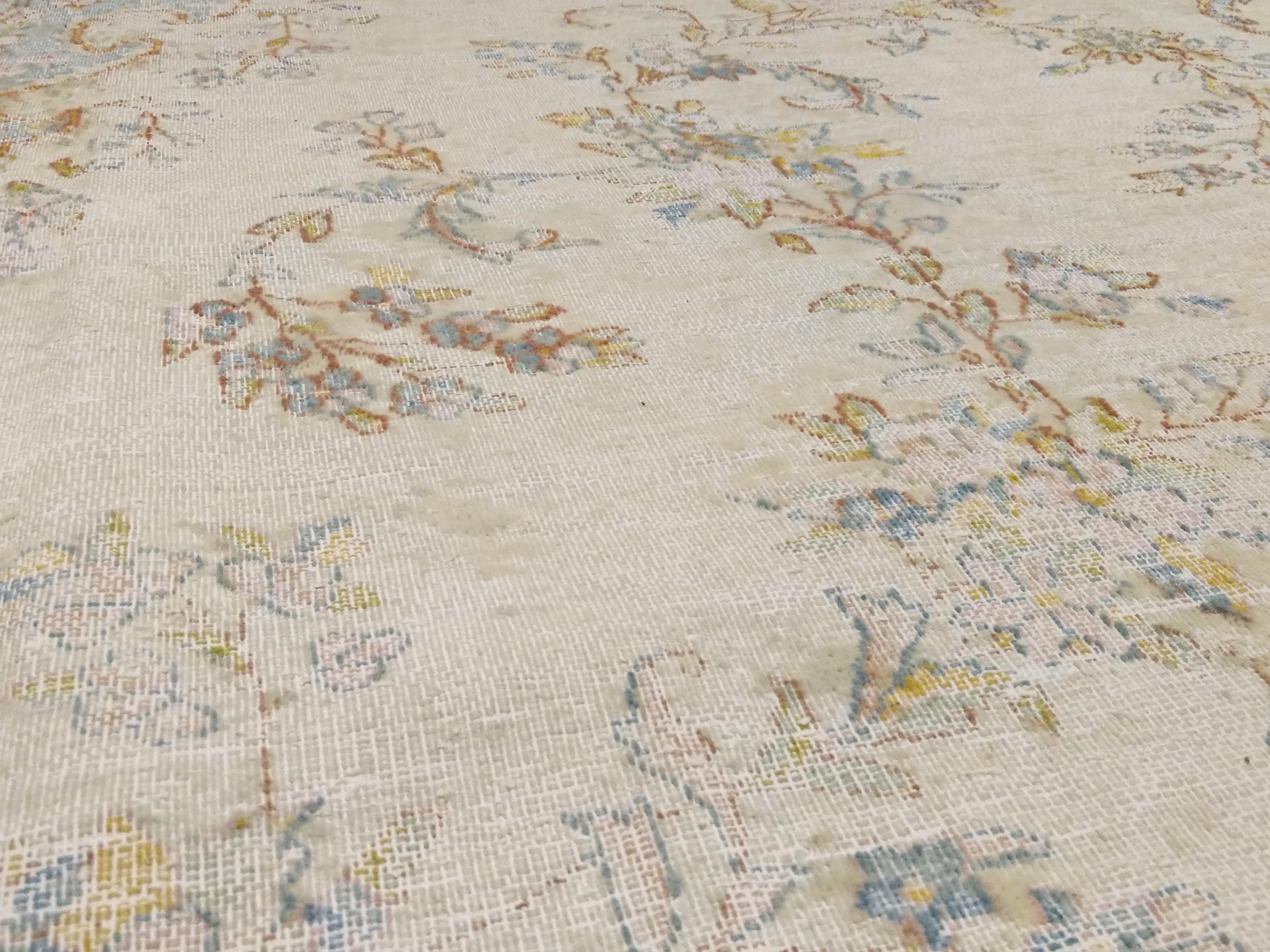 Hand-Knotted Antique Distressed Soft Coloured Botanical Design Decorative Carpet For Sale