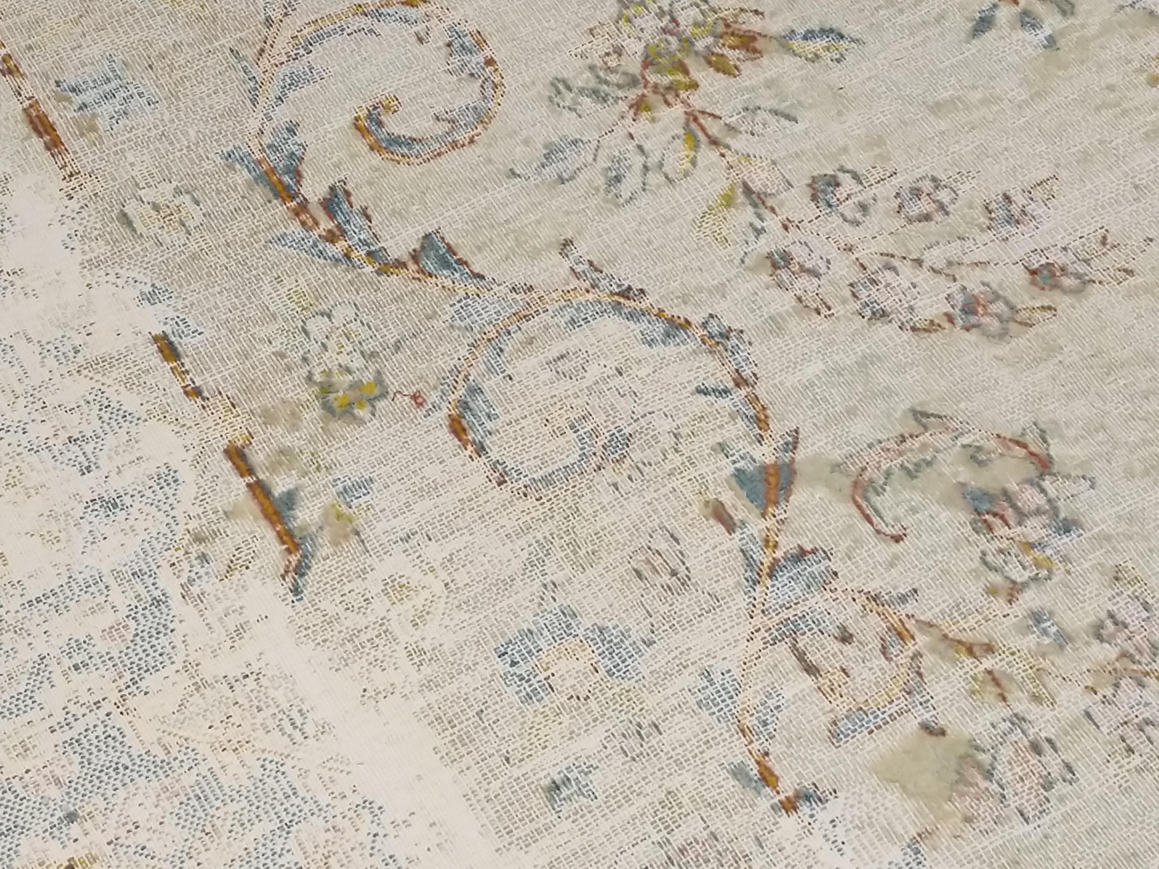 20th Century Antique Distressed Soft Coloured Botanical Design Decorative Carpet For Sale