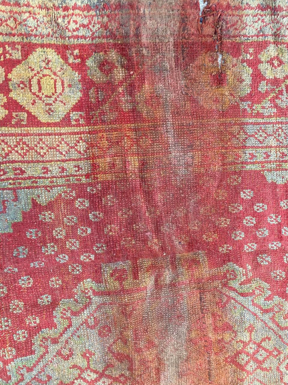 Hand-Knotted Antique Distressed Turkish Oushak Rug For Sale